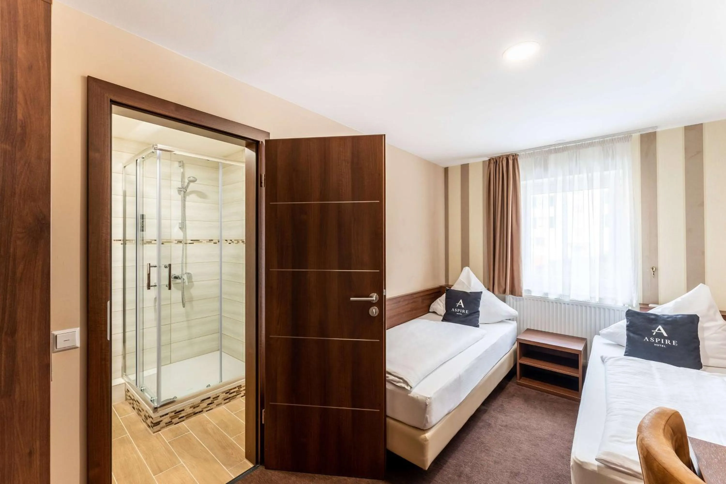 Photo of the whole room, Bed in Stadthotel Reutlingen