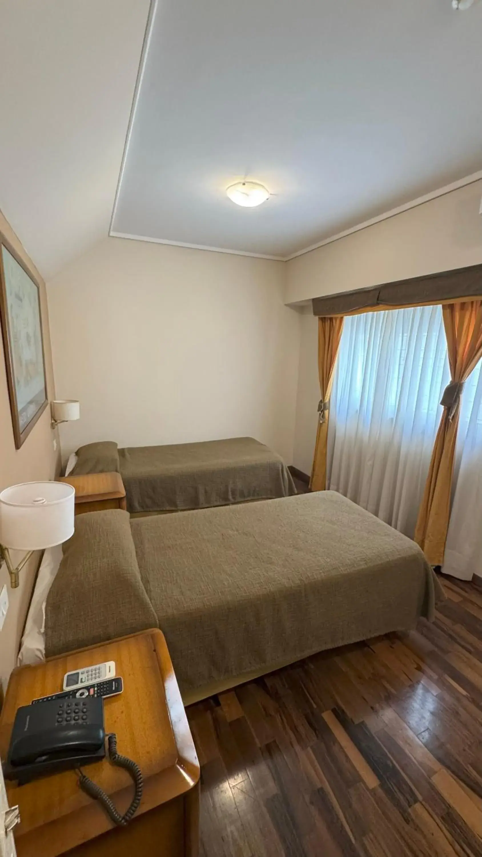 Photo of the whole room, Bed in Tritone Hotel Photo of the whole room, Bed in Tritone Hotel