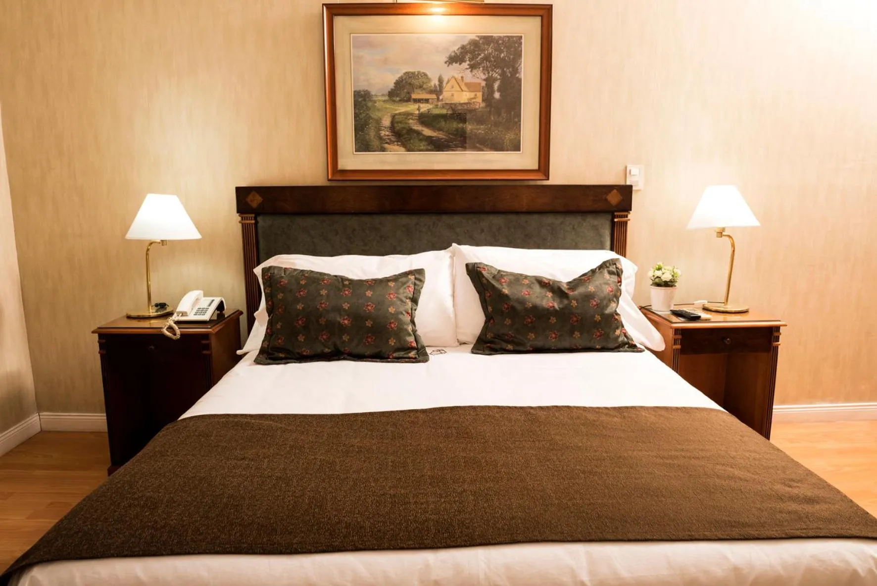 Bed in Mayflower Suites