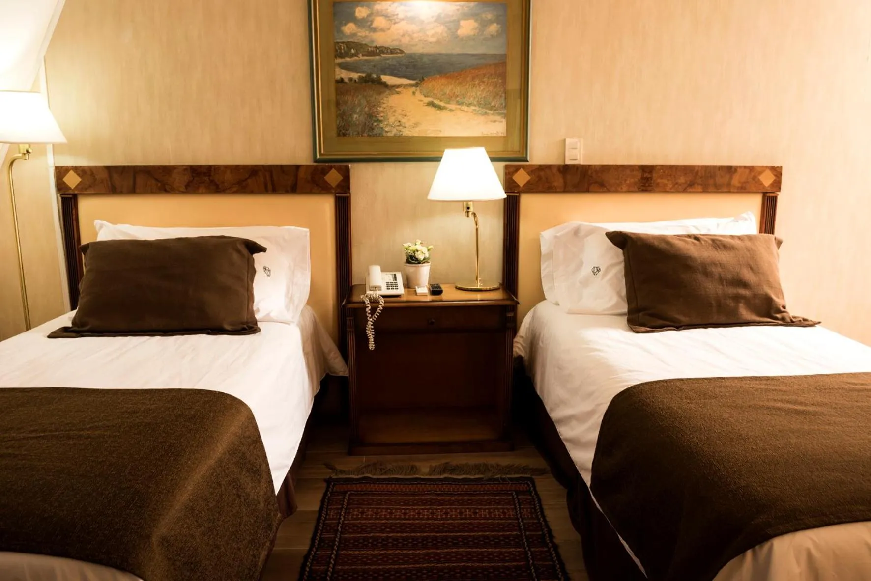 Bed in Mayflower Suites