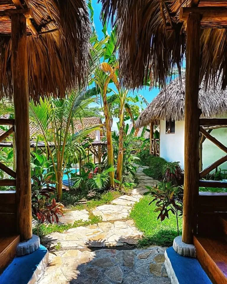 Garden in Hotel Cabañas Puesta del Sol