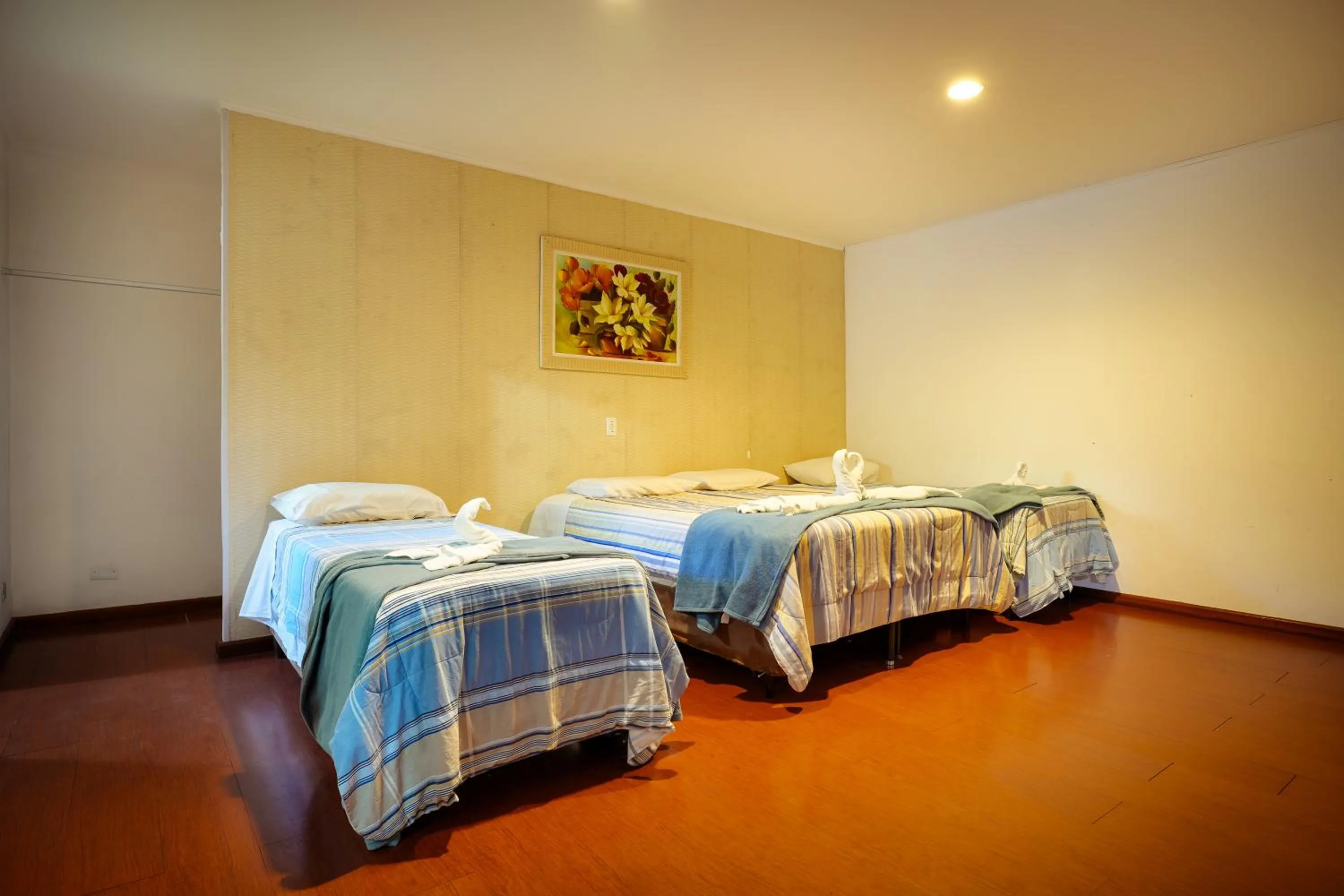 Bed in VELINN Pousada Flores do Capivari