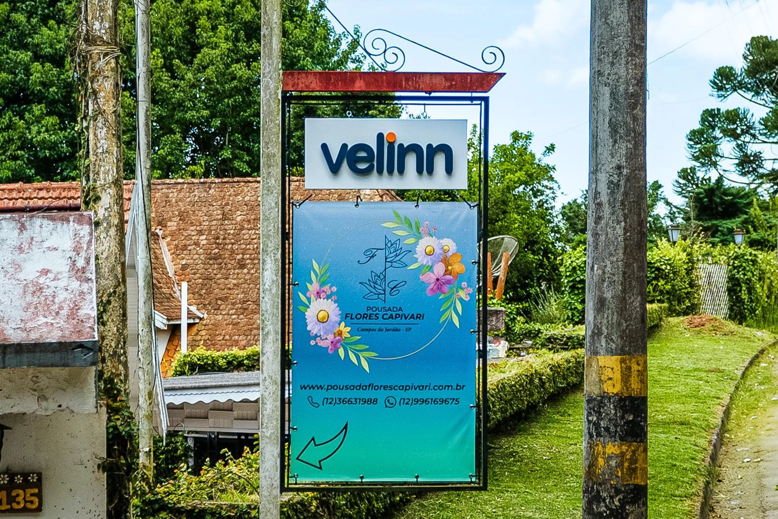 Logo/Certificate/Sign in VELINN Pousada Flores do Capivari