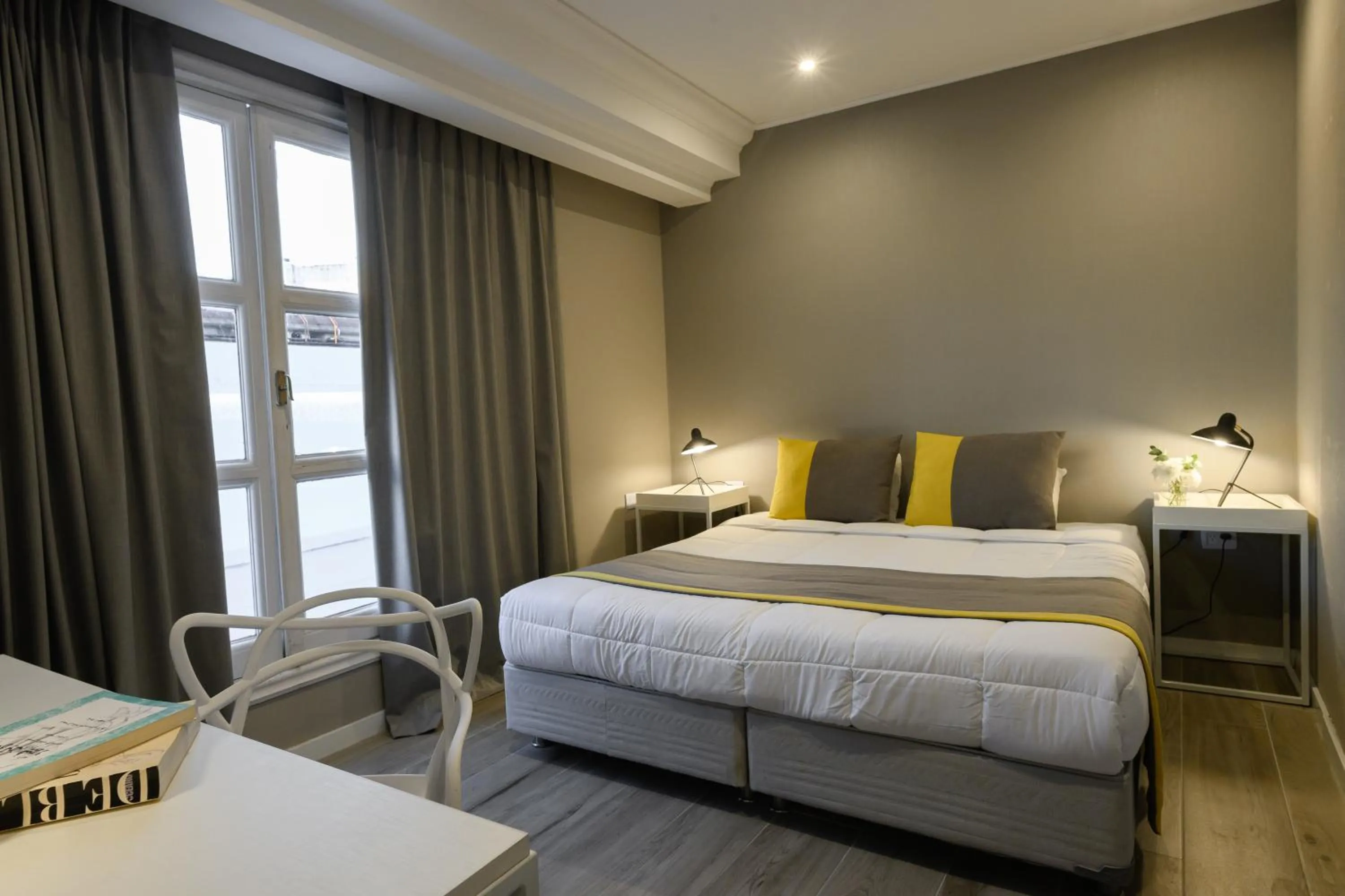 Bed in Midtown Boutique Hotel