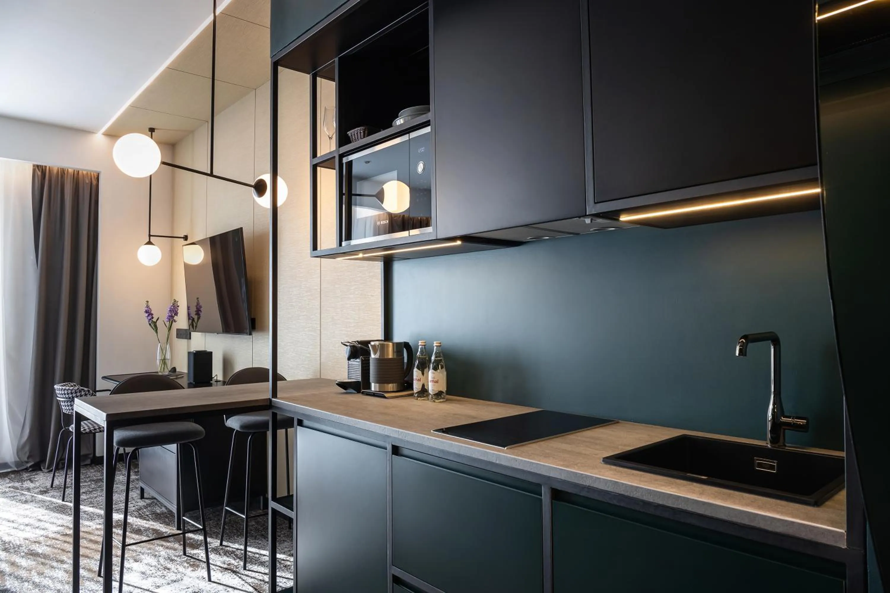 Kitchen or kitchenette in Novotel Living Almaty Jetisu