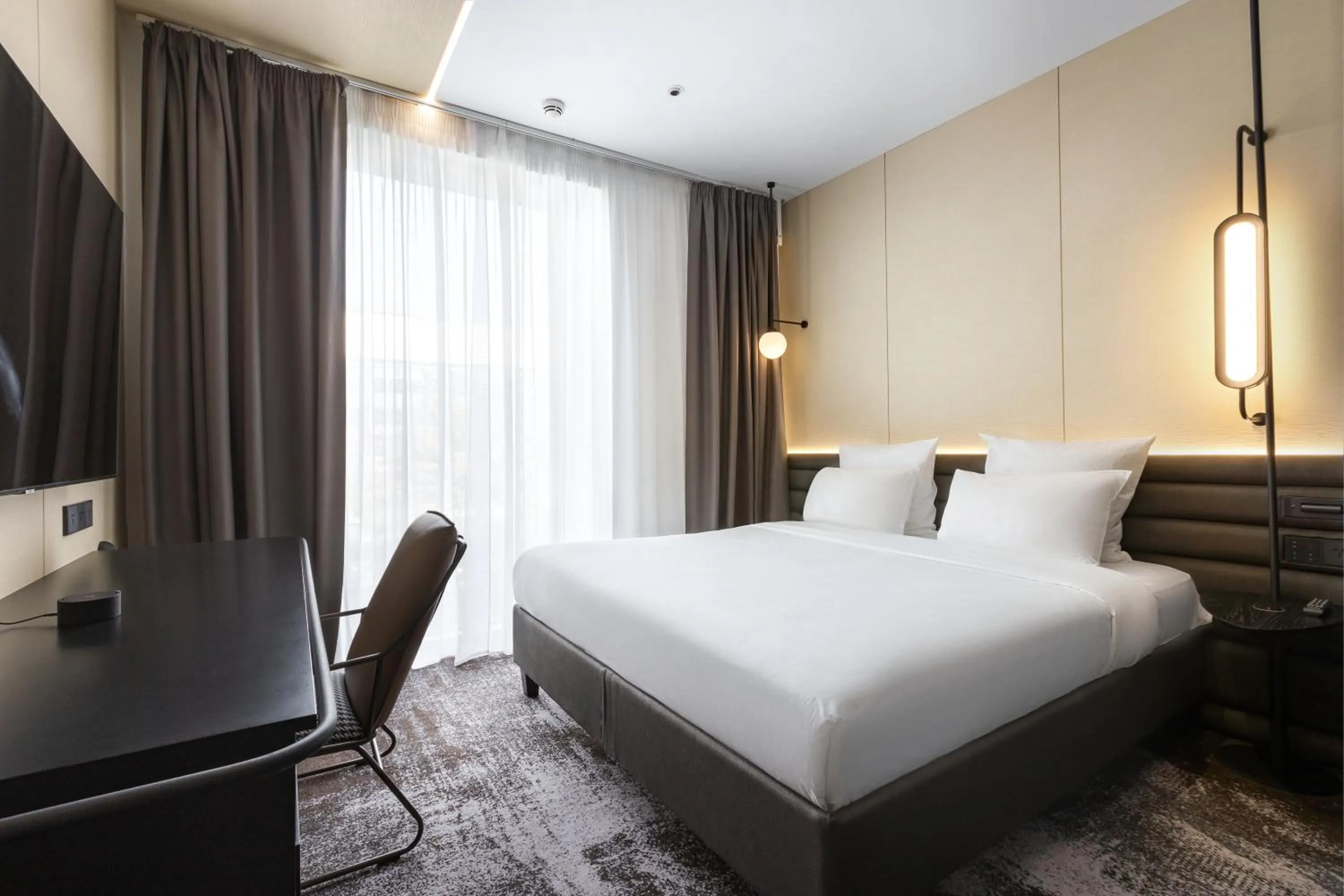 Bed in Novotel Living Almaty Jetisu