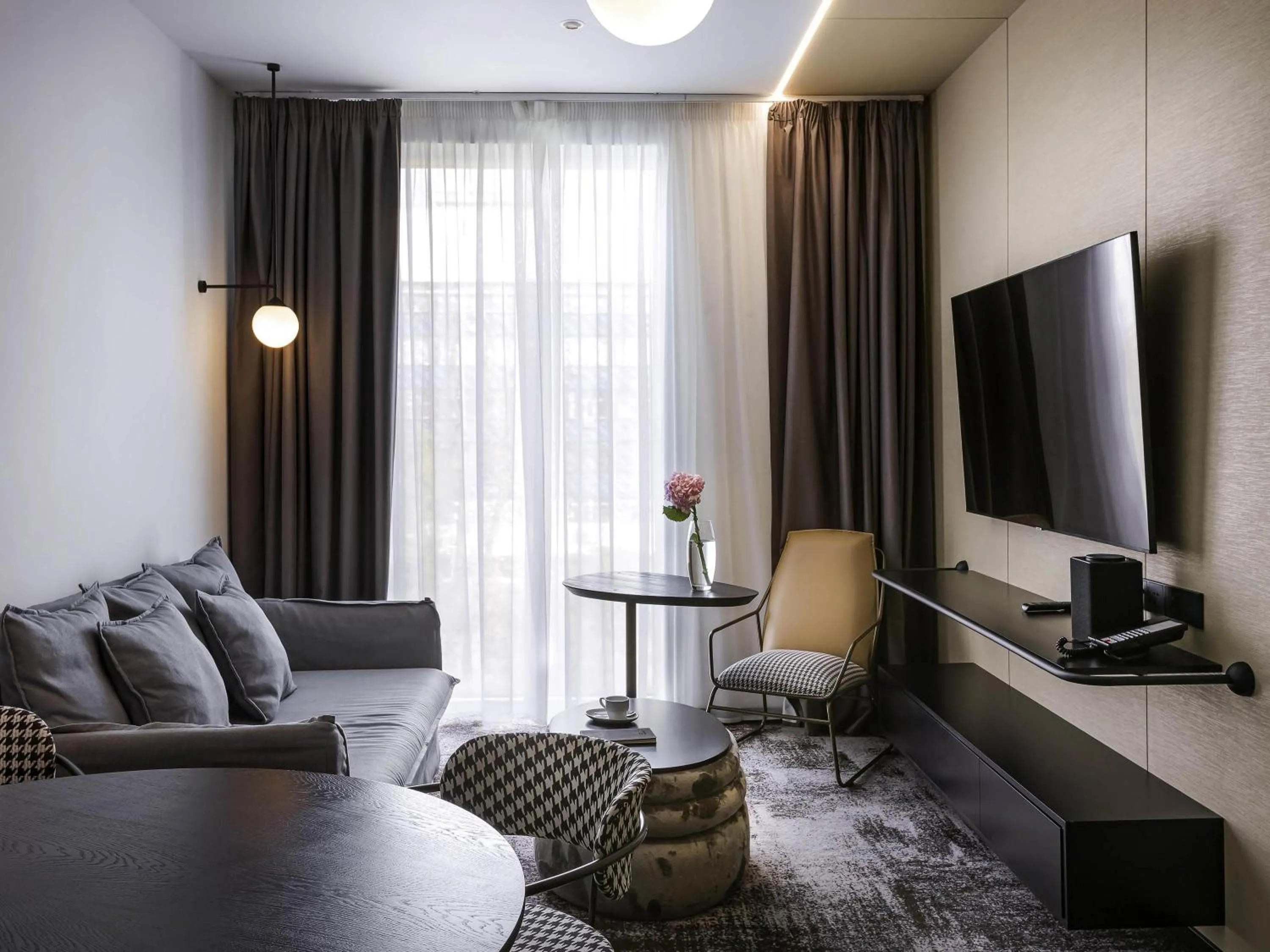 Bedroom in Novotel Living Almaty Jetisu