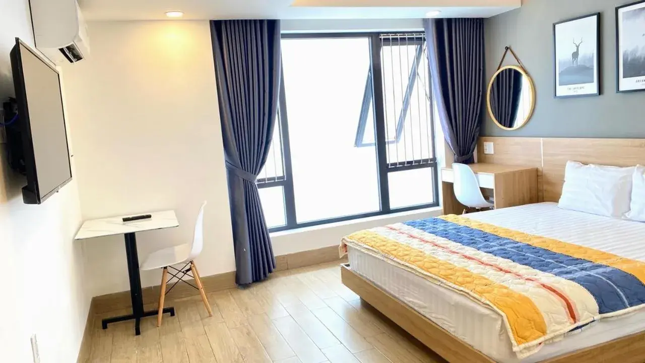 Bed in TDMAISON Hotel & Apartment Bed in TDMAISON Hotel & Apartment