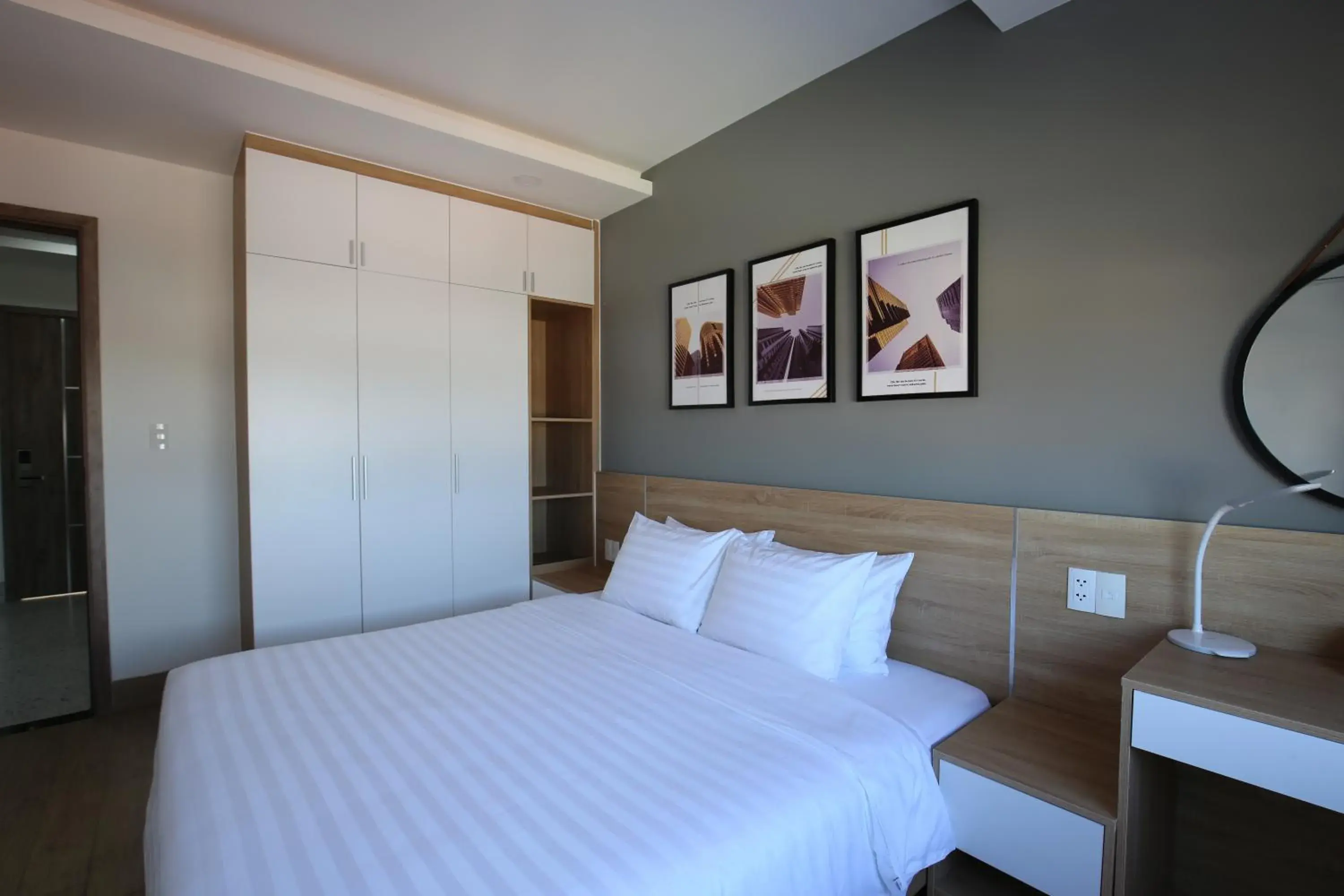 Bed in TDMAISON Hotel & Apartment Bed in TDMAISON Hotel & Apartment