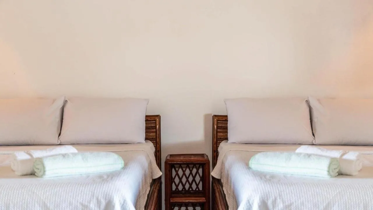 Bed in Pousada Vila Mangaba