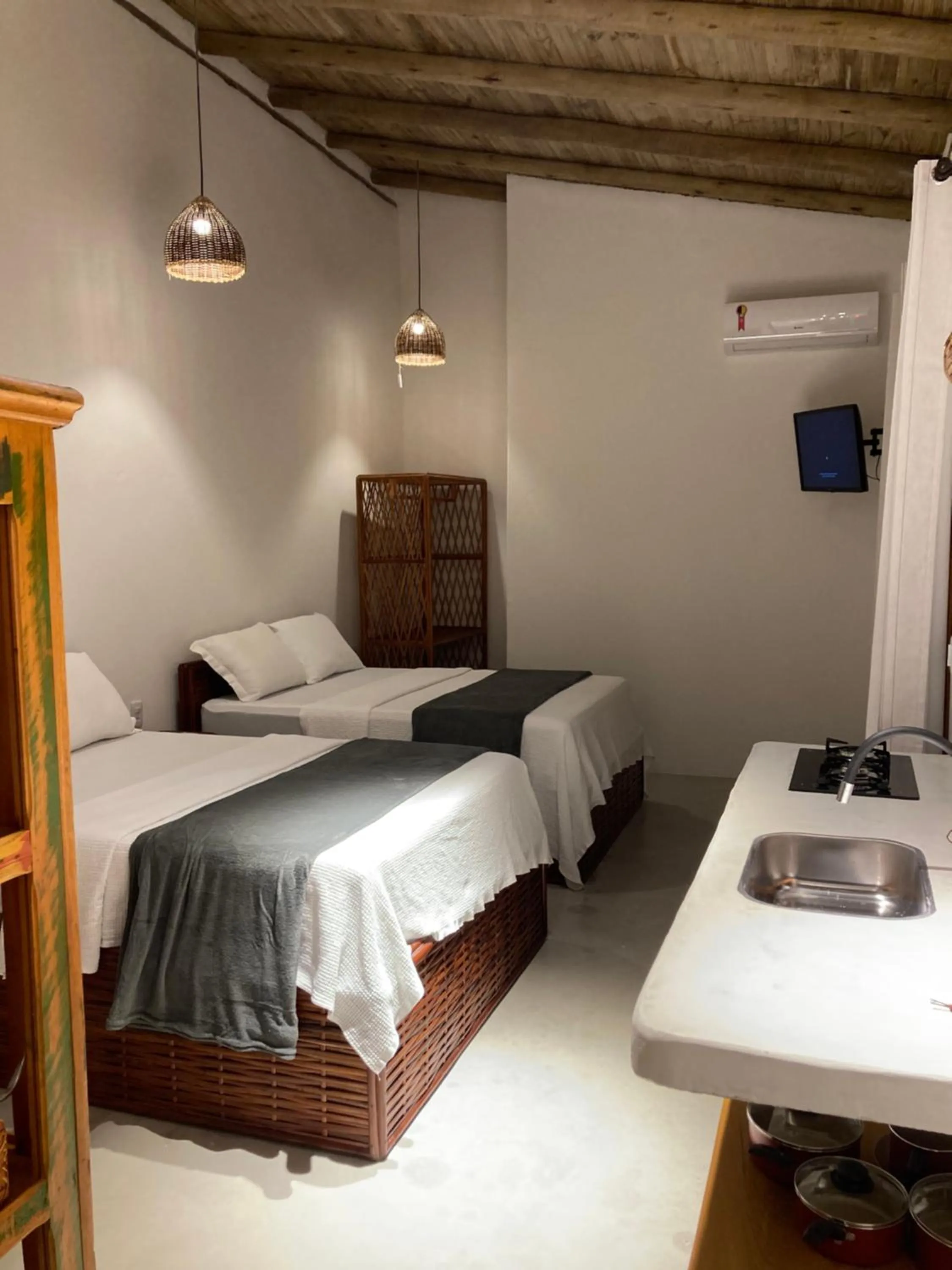 Kitchen or kitchenette, Bed in Pousada Vila Mangaba