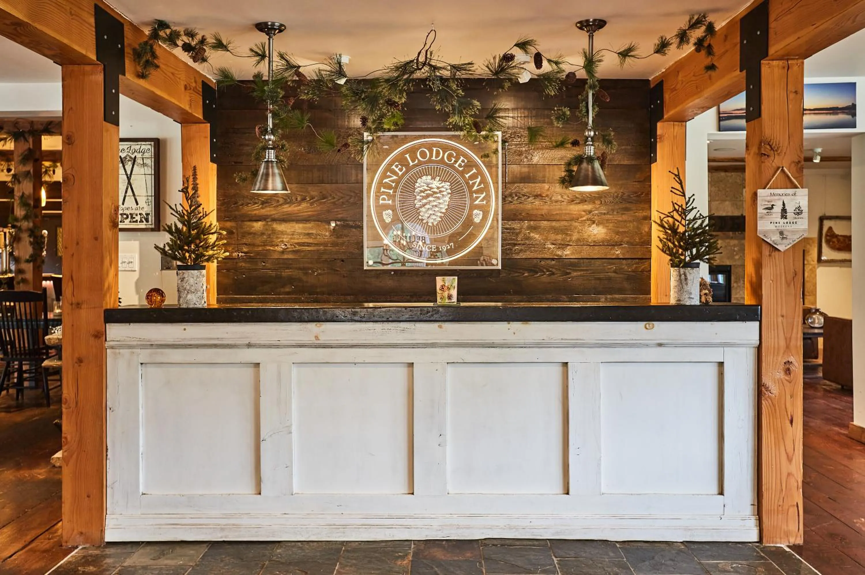 Property logo or sign in 3 Pines Lodge Muskoka