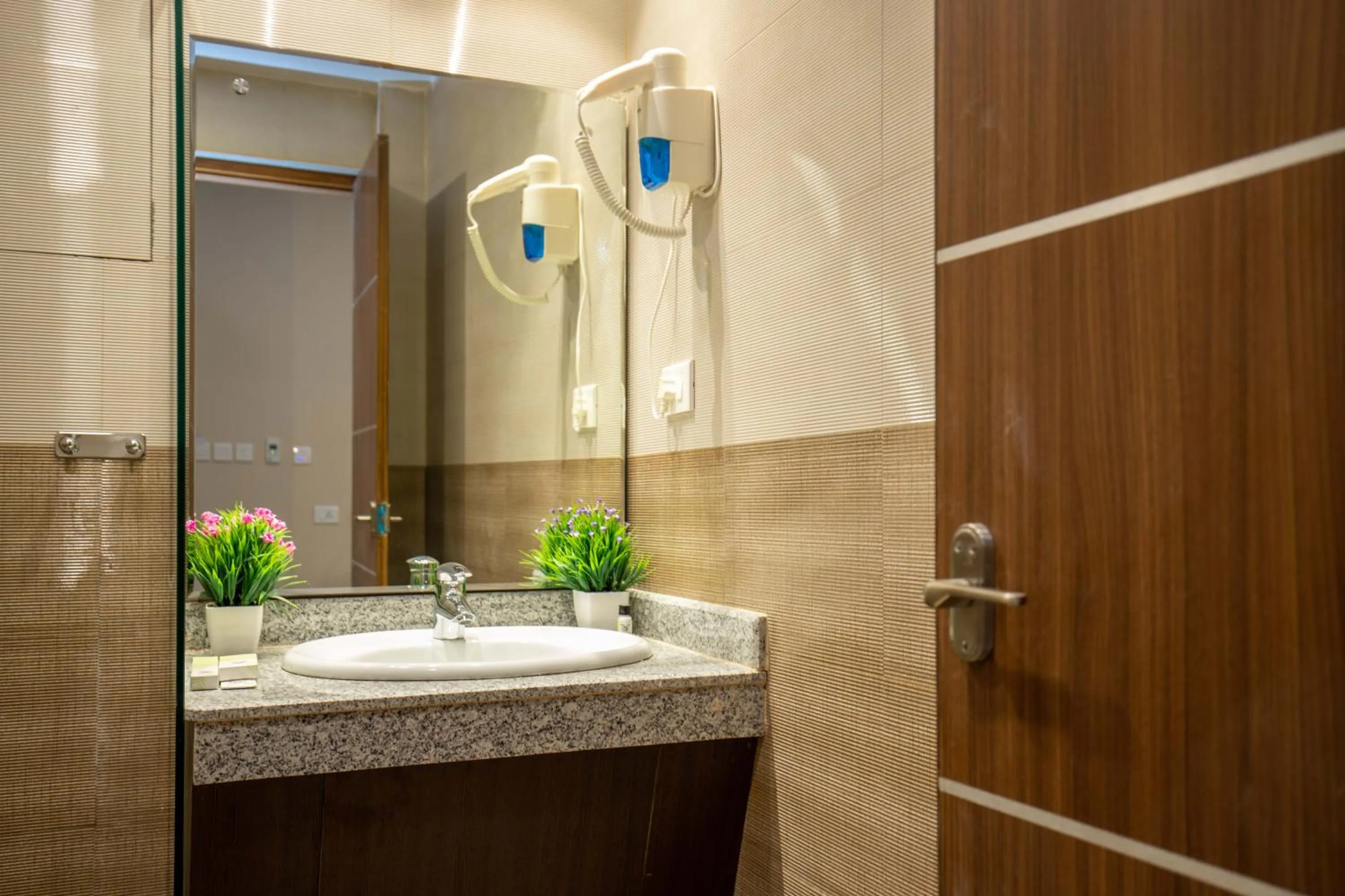 Bathroom in Hotel Palm International