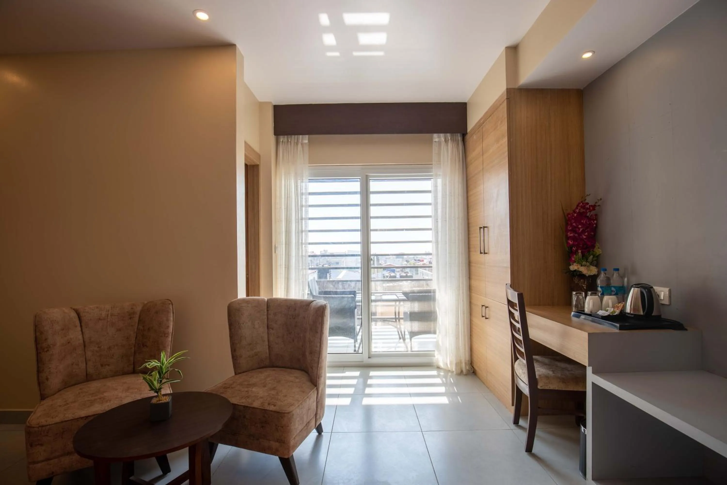 Seating area in Hotel Palm International