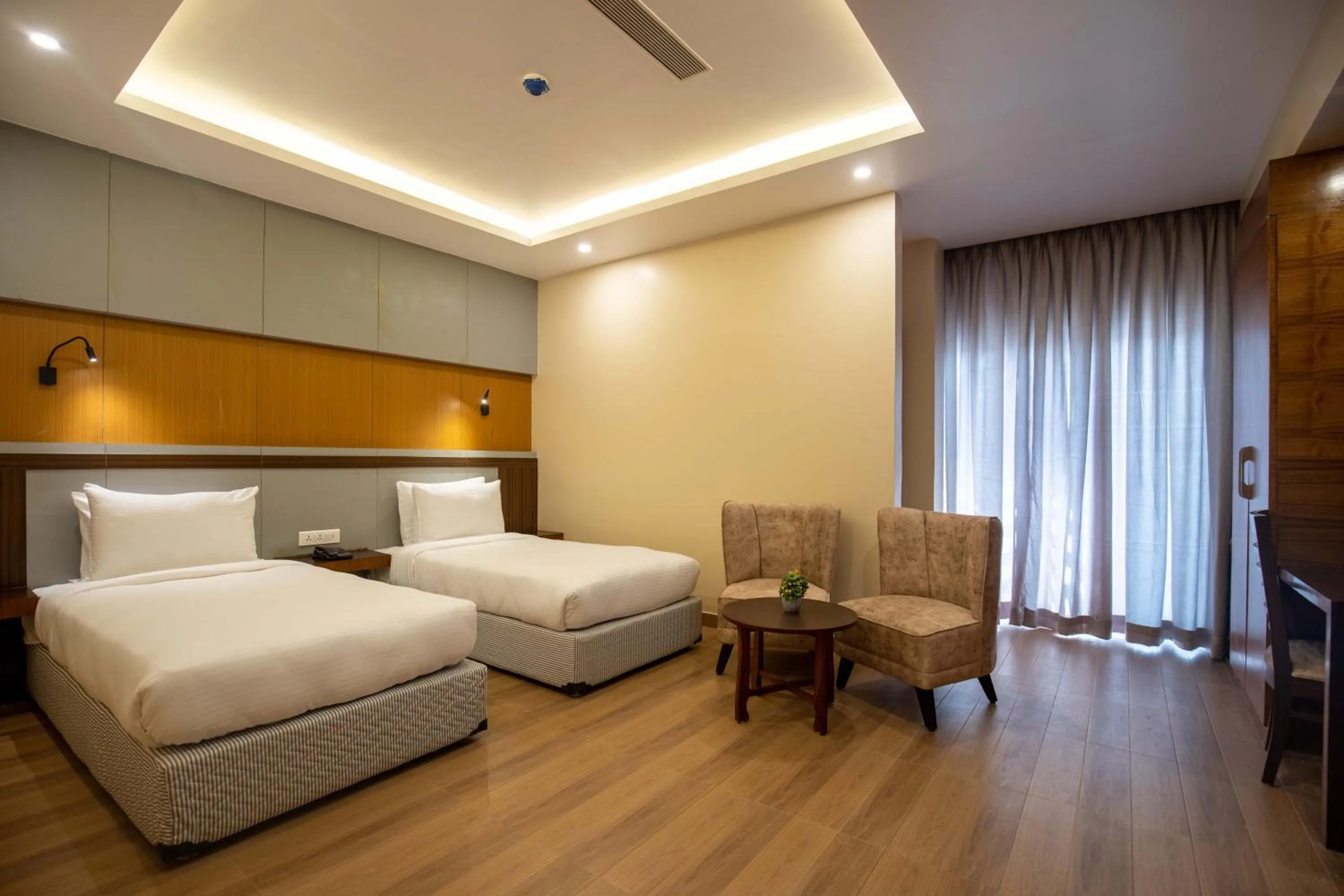 Bed in Hotel Palm International