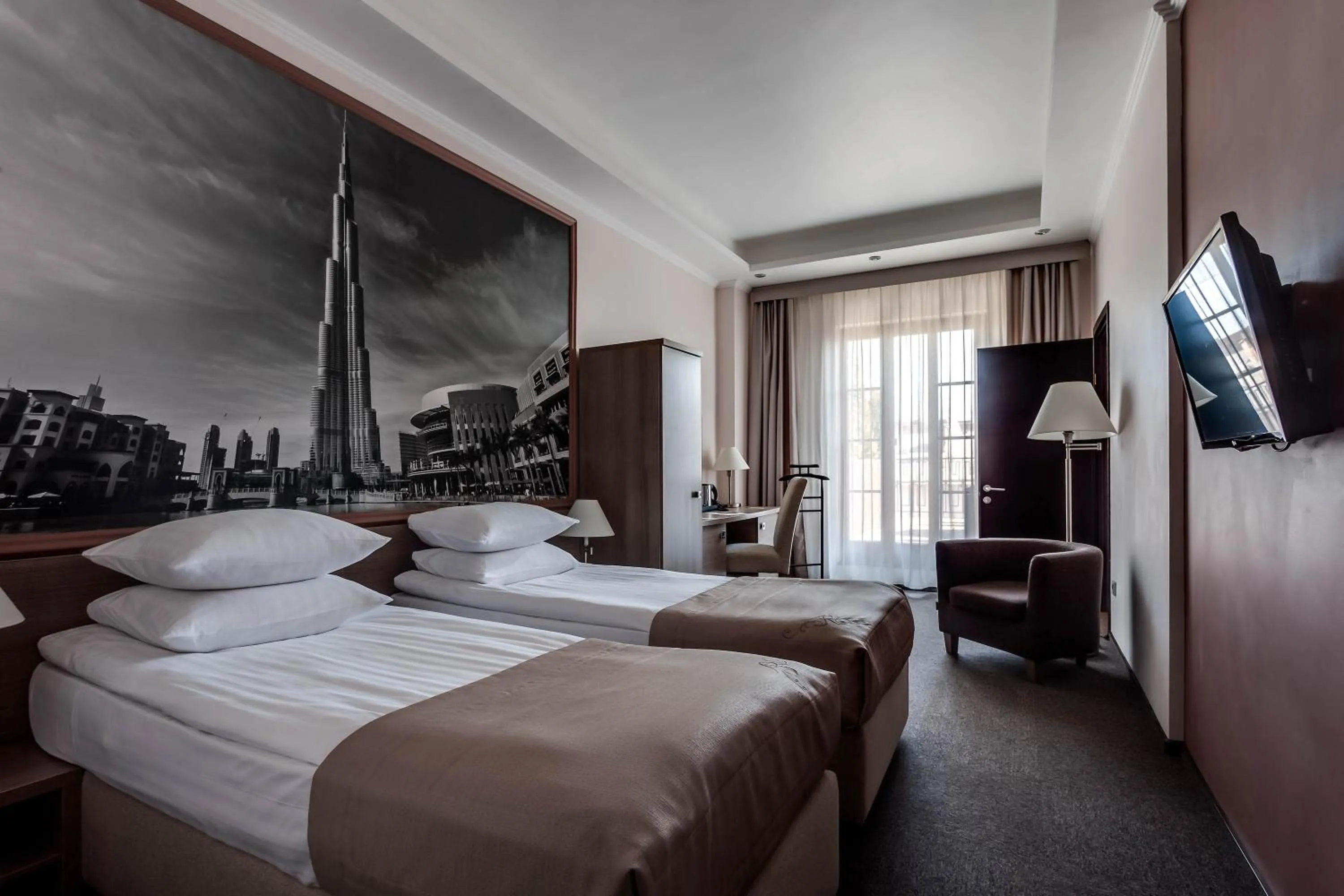 Photo of the whole room, Bed in Rius Hotel Lviv