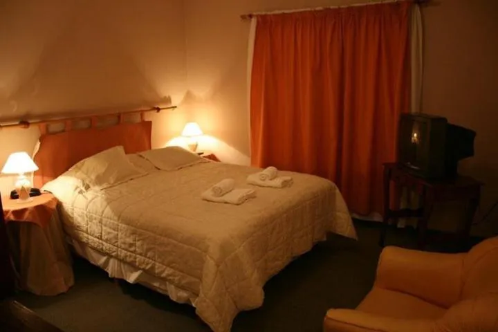 Photo of the whole room, Bed in Kelta Hotel El Calafate