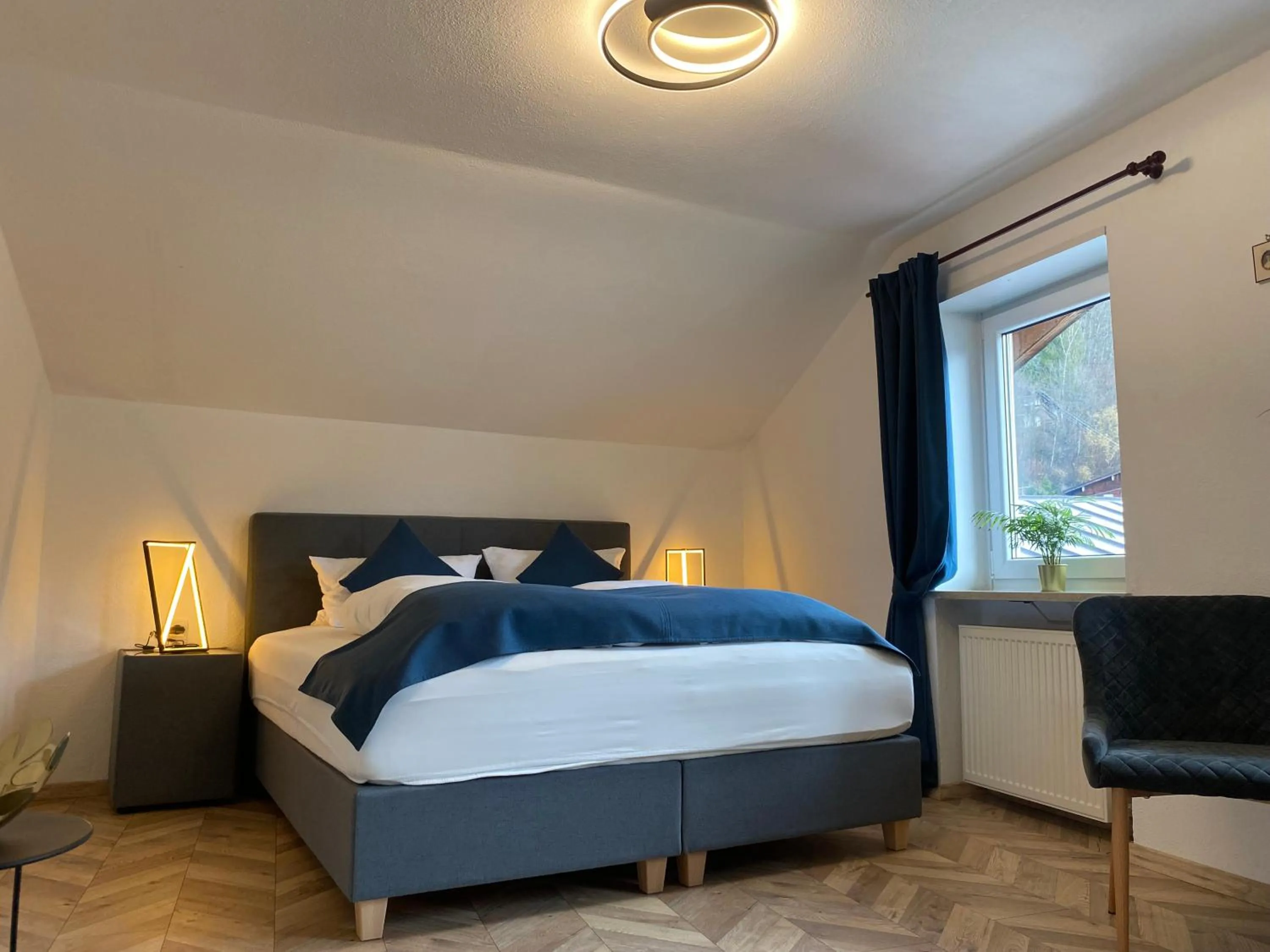 Bed in Pension und Ferienwohnung Frech