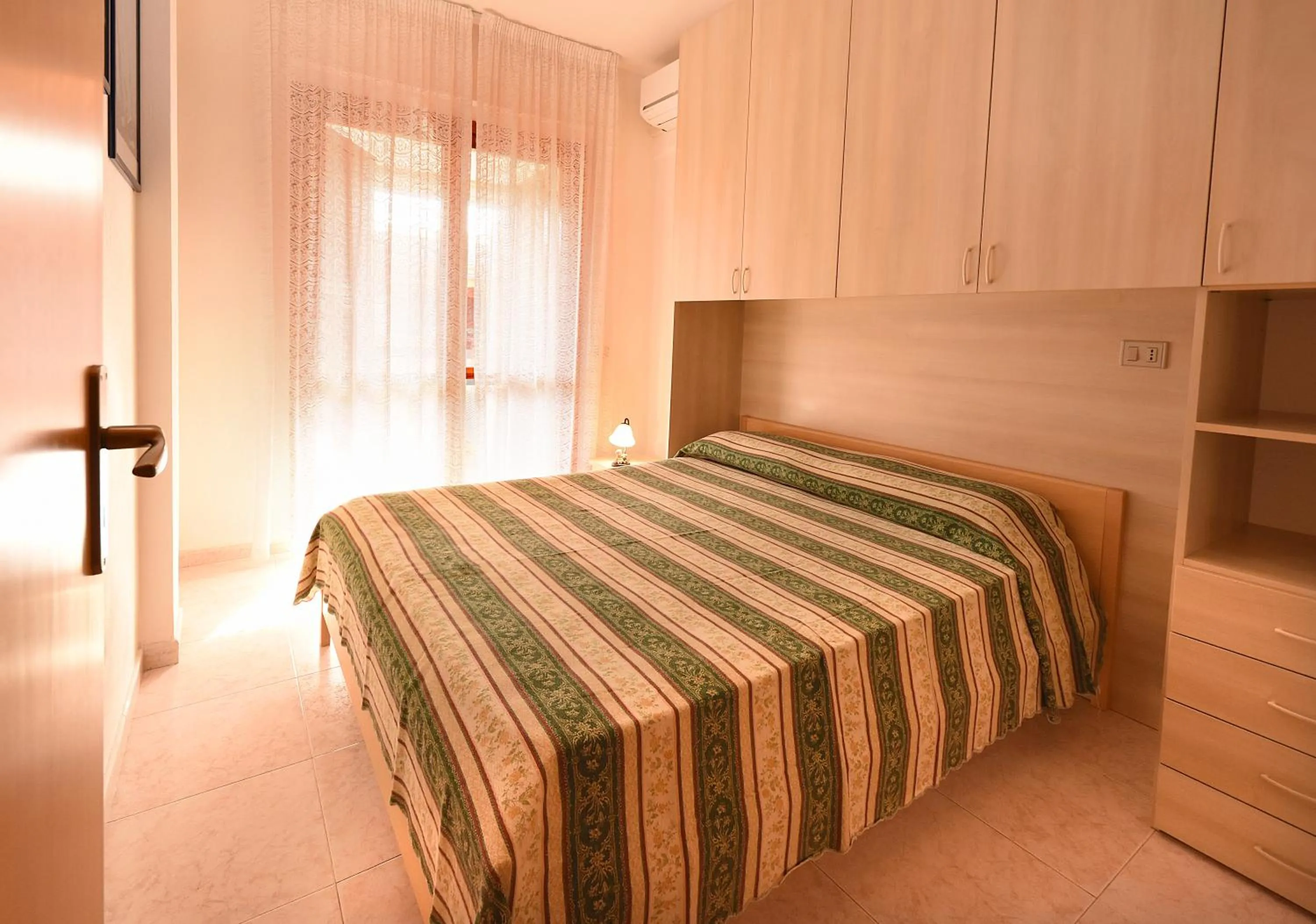Bed in Residenza Le Due Palme