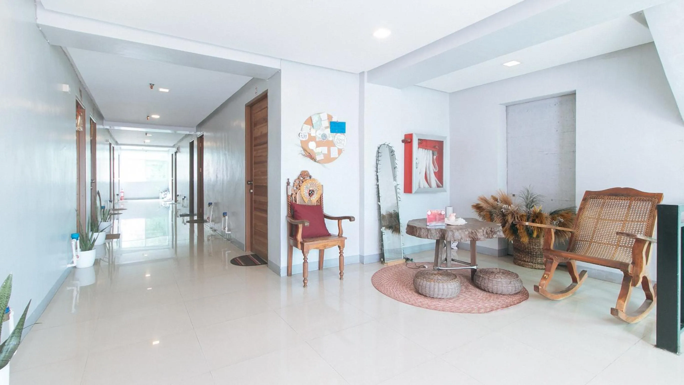 Living room in Budget Backpackers Transient House near NAIA by RedDoorz