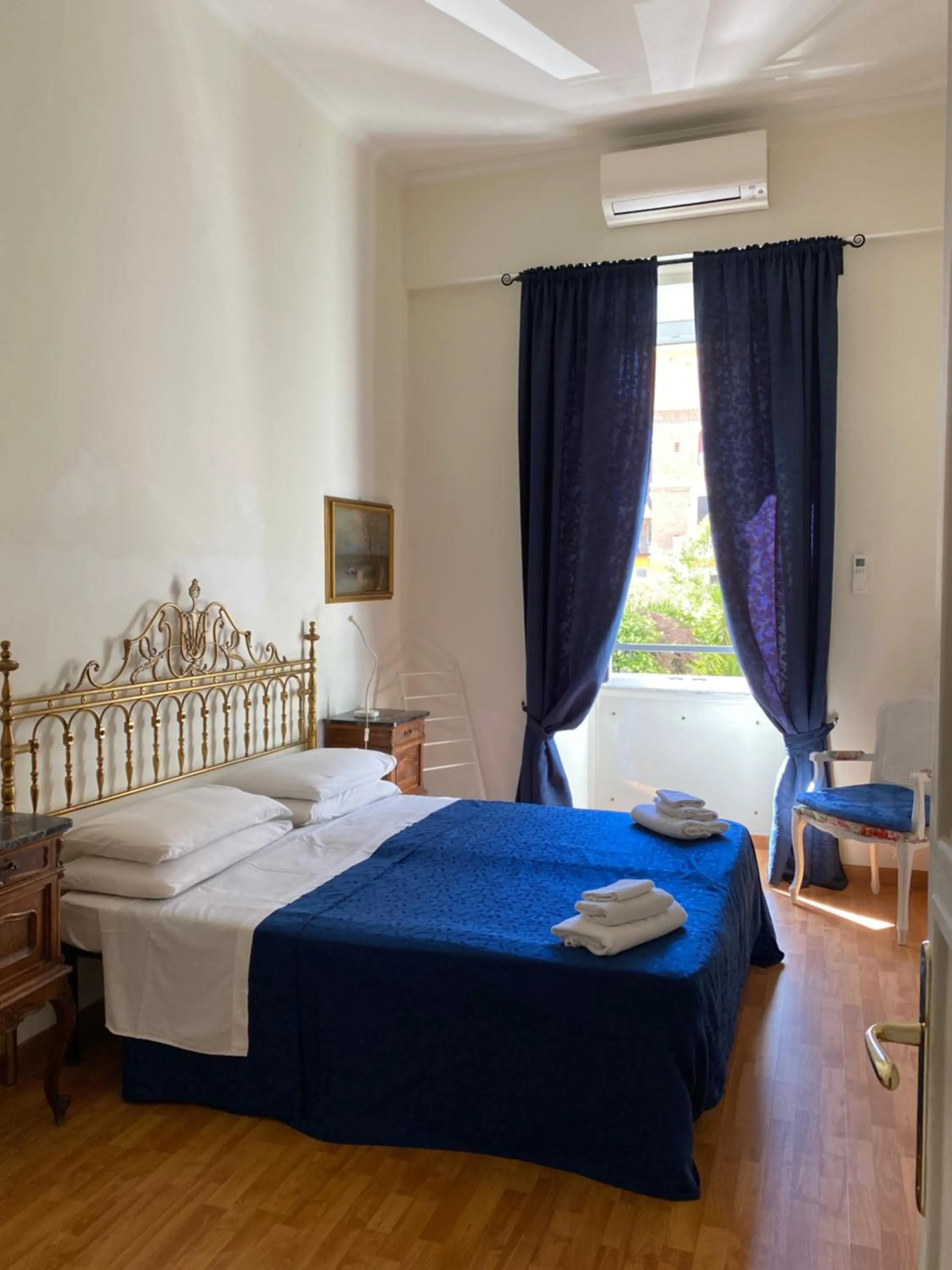 Bed in Otium Maecenatis Apartments