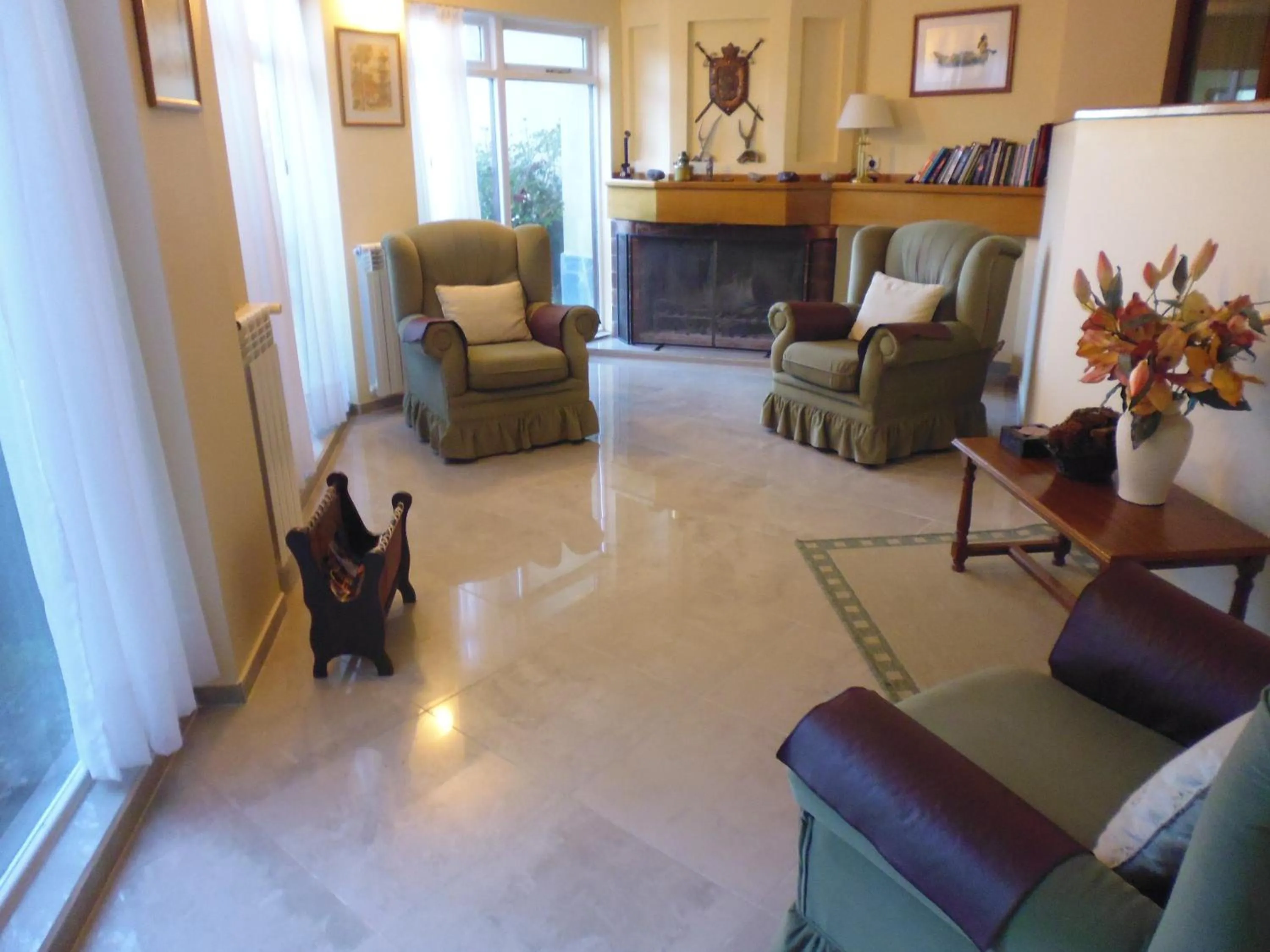 Communal lounge/ TV room in Estancia La Quinta