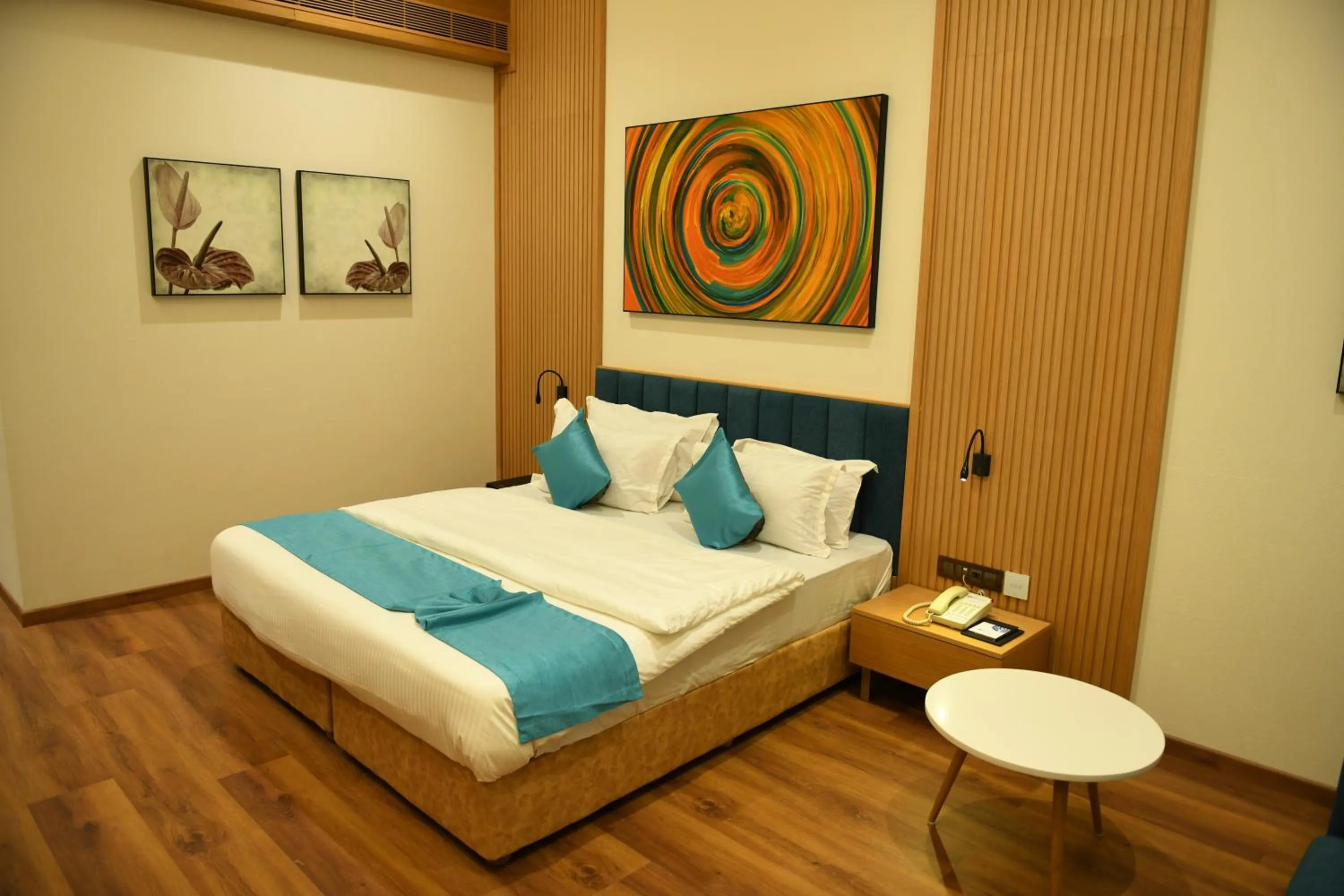Bed in Hotel Blueivy Anand