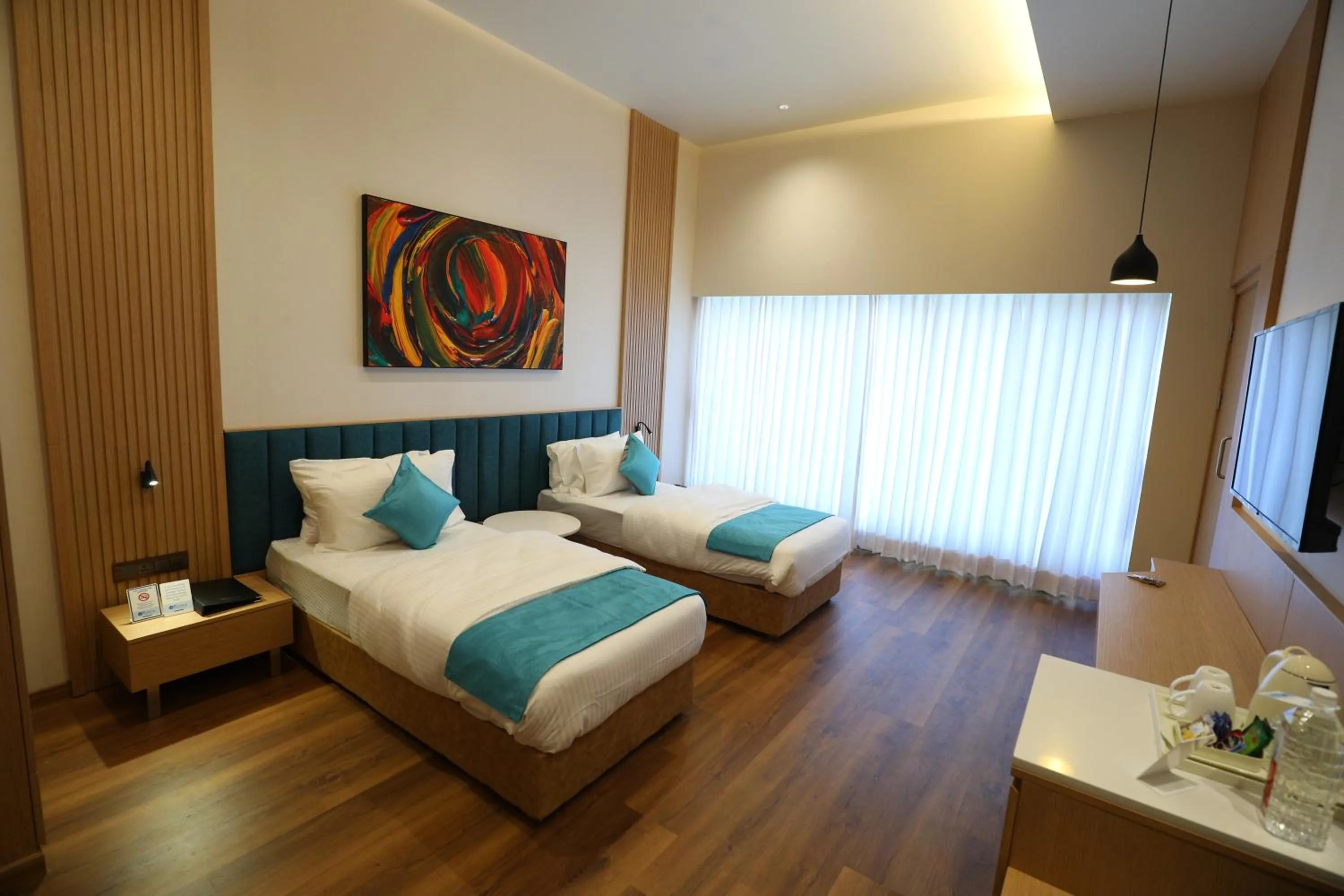 Bed in Hotel Blueivy Anand