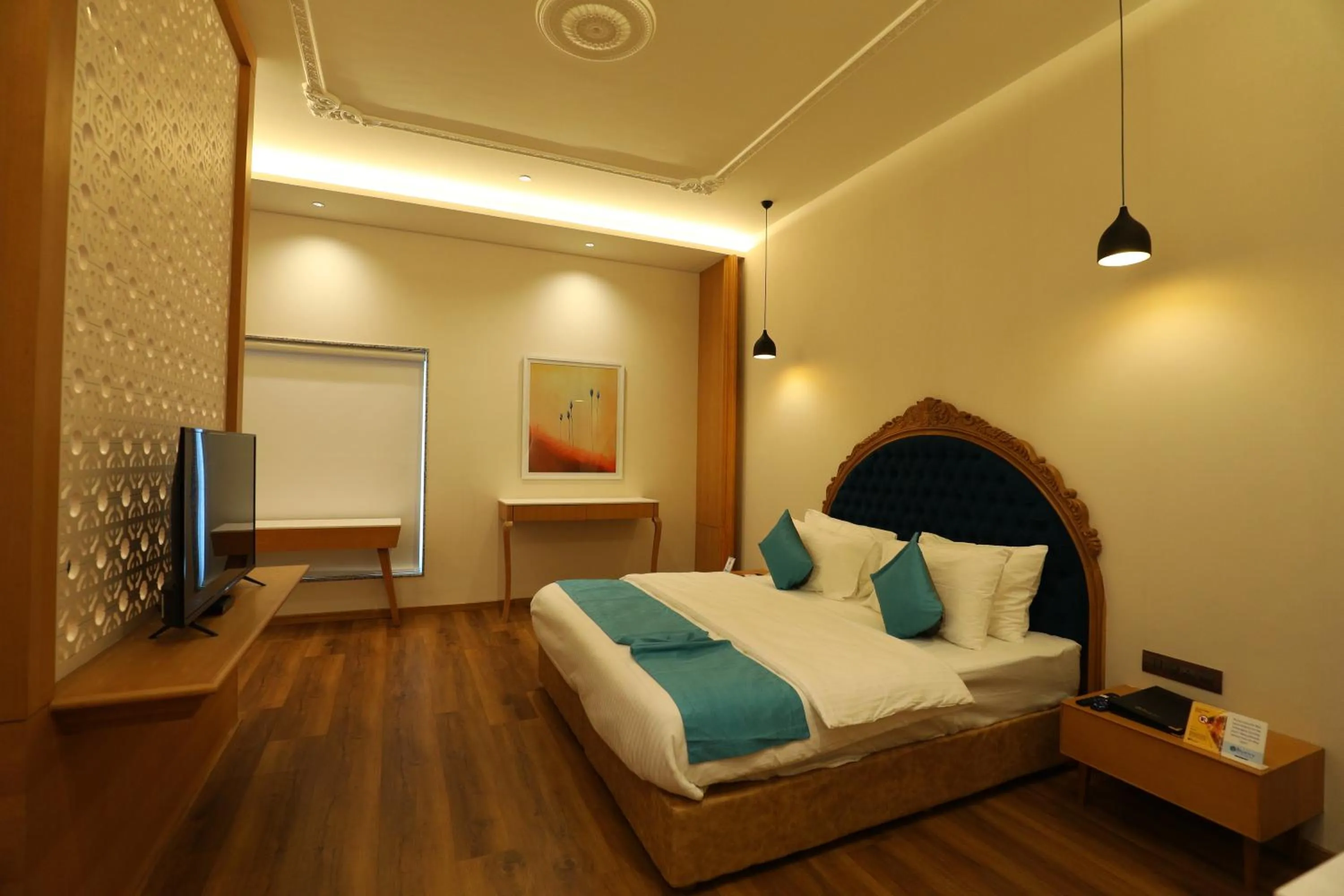 Bed in Hotel Blueivy Anand