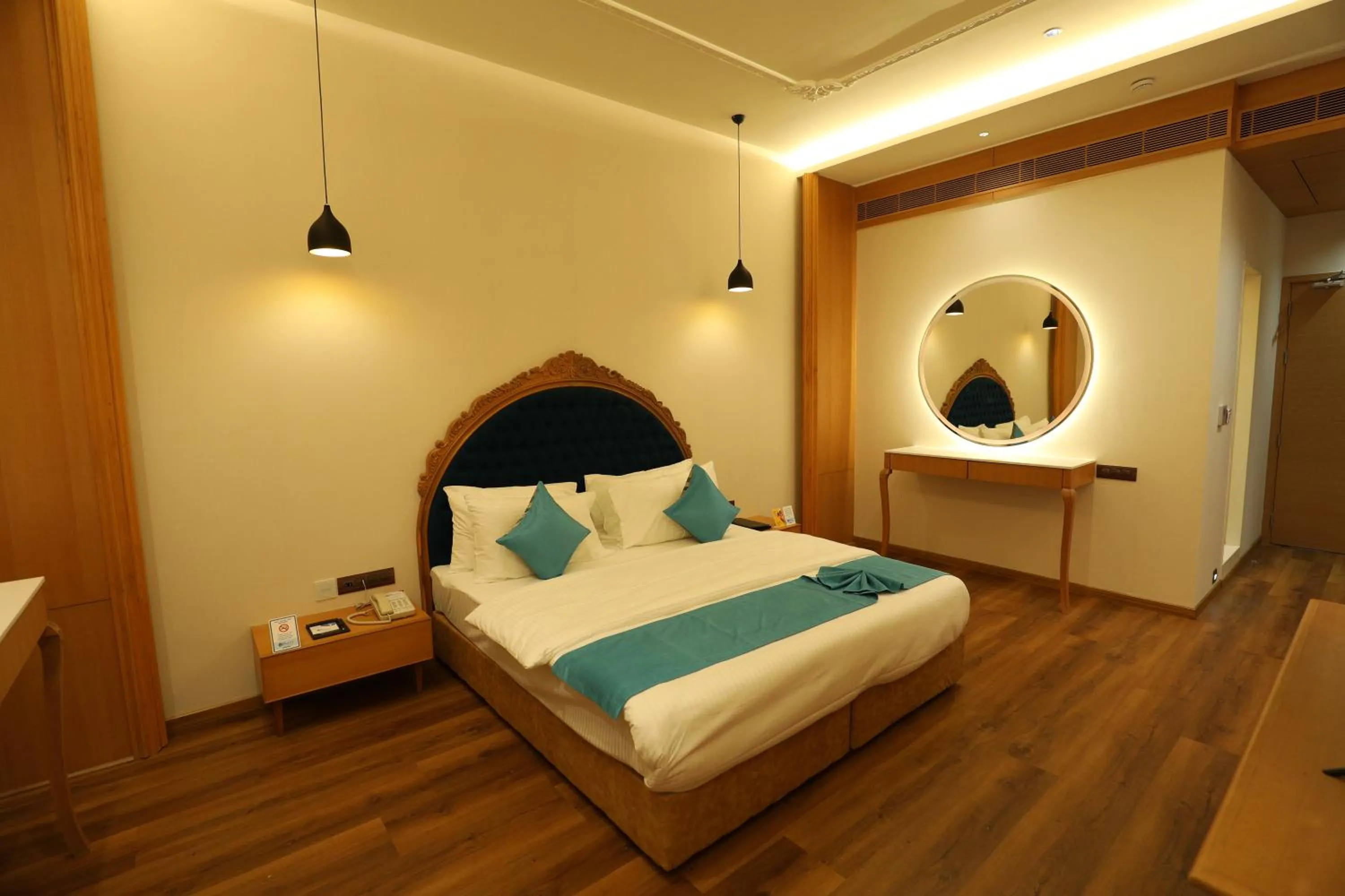 Bed in Hotel Blueivy Anand