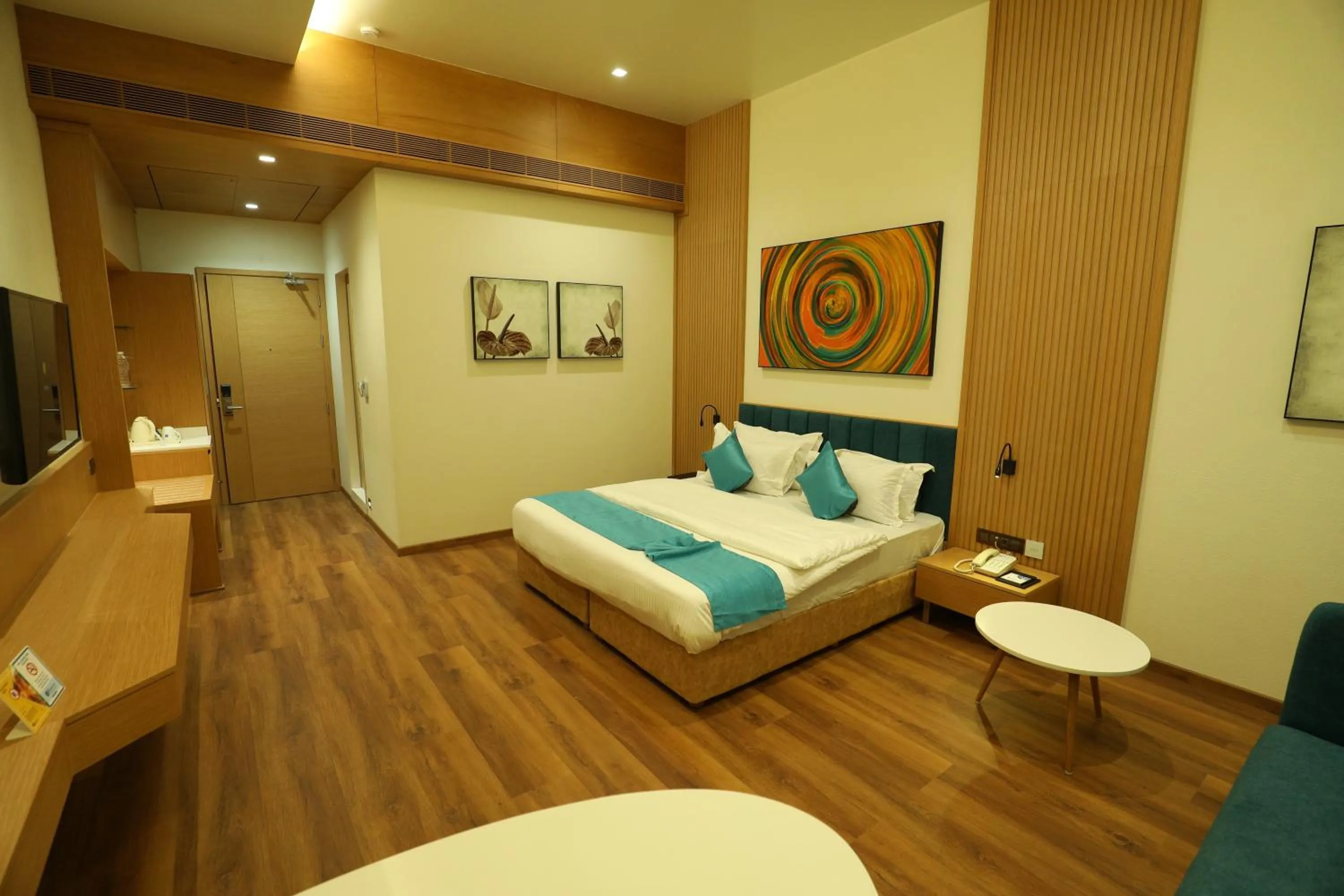 Photo of the whole room, Bed in Hotel Blueivy Anand