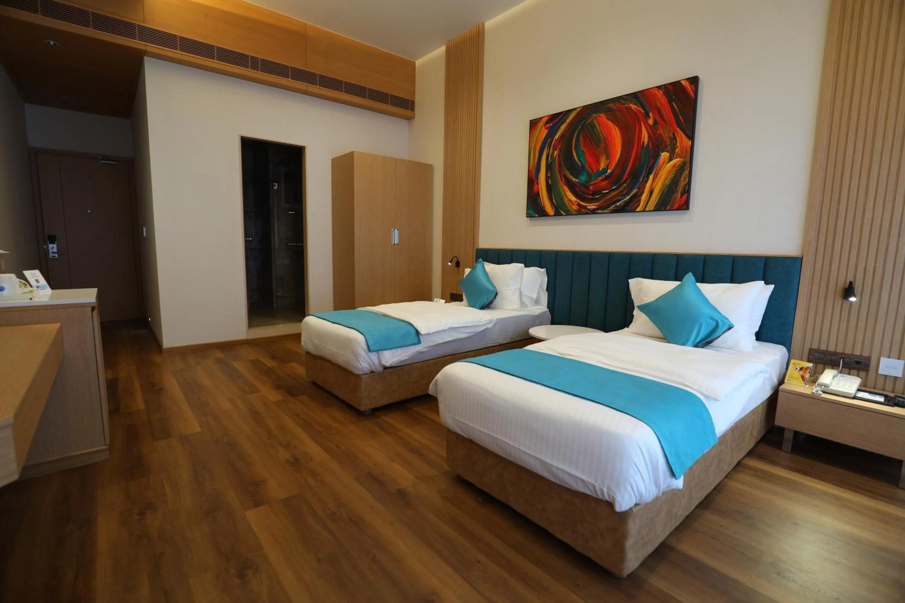 Bed in Hotel Blueivy Anand