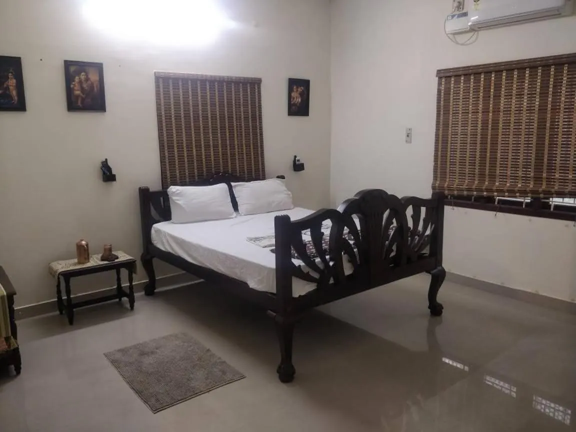 Bed in TANJORE INN