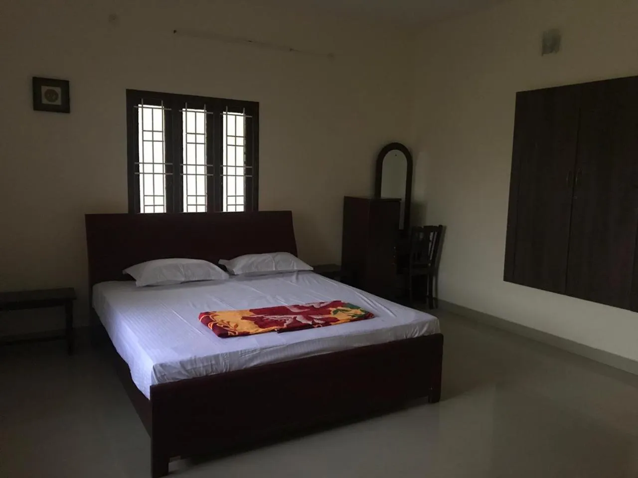 Bed in TANJORE INN