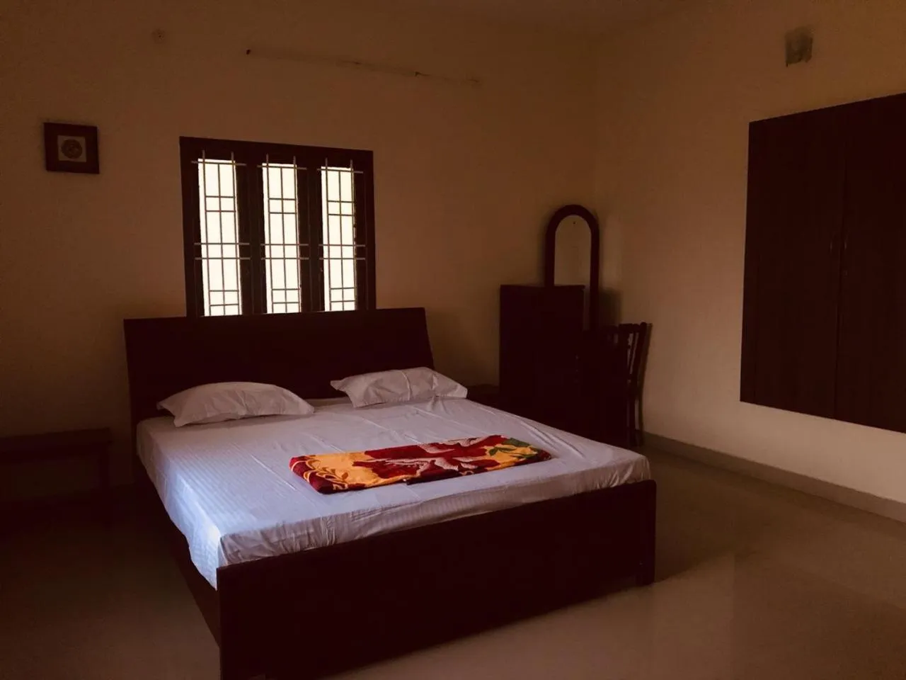 Bed in TANJORE INN