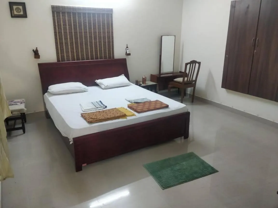 Bed in TANJORE INN