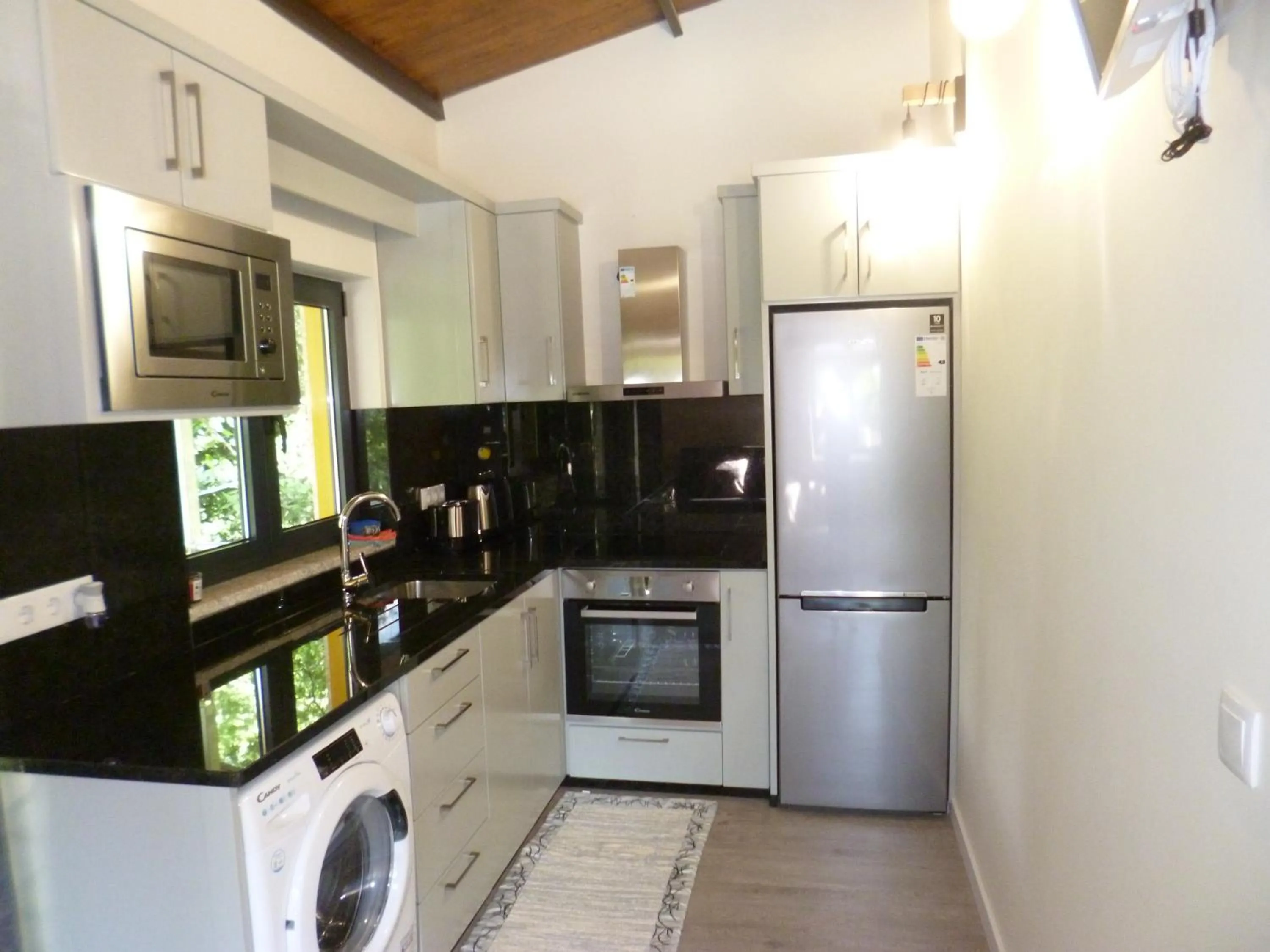 Kitchen or kitchenette in Casas das Guimbras
