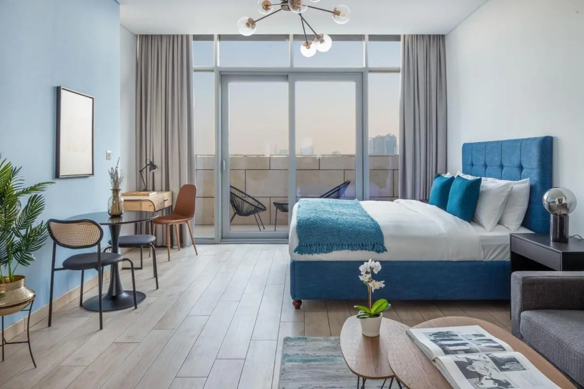 Bed in Silkhaus large modern studio with Burj Khalifa view
