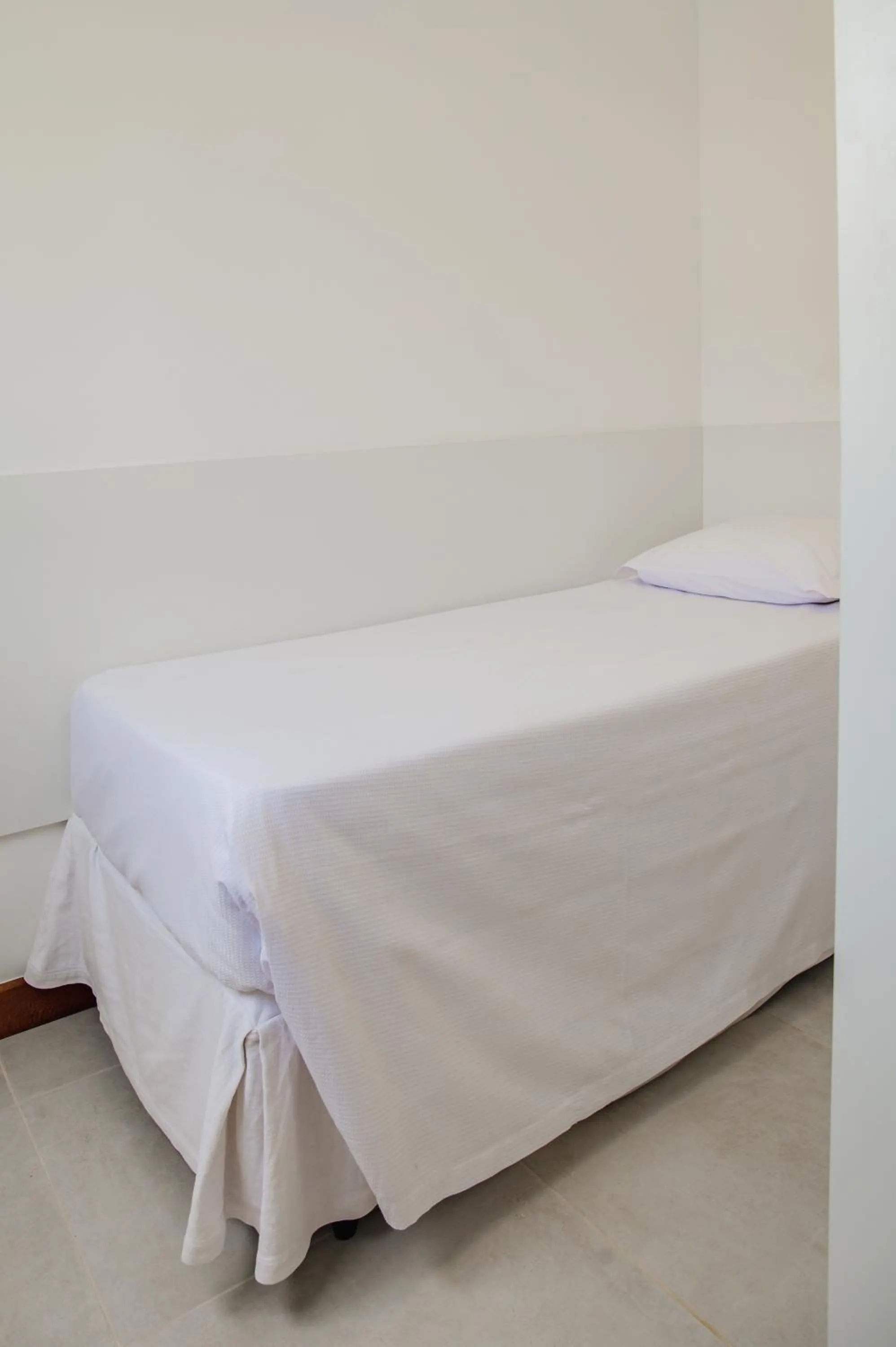 Bed in Hotel Boutique & Spa Ponta de Inhambupe by Slaviero Hotéis