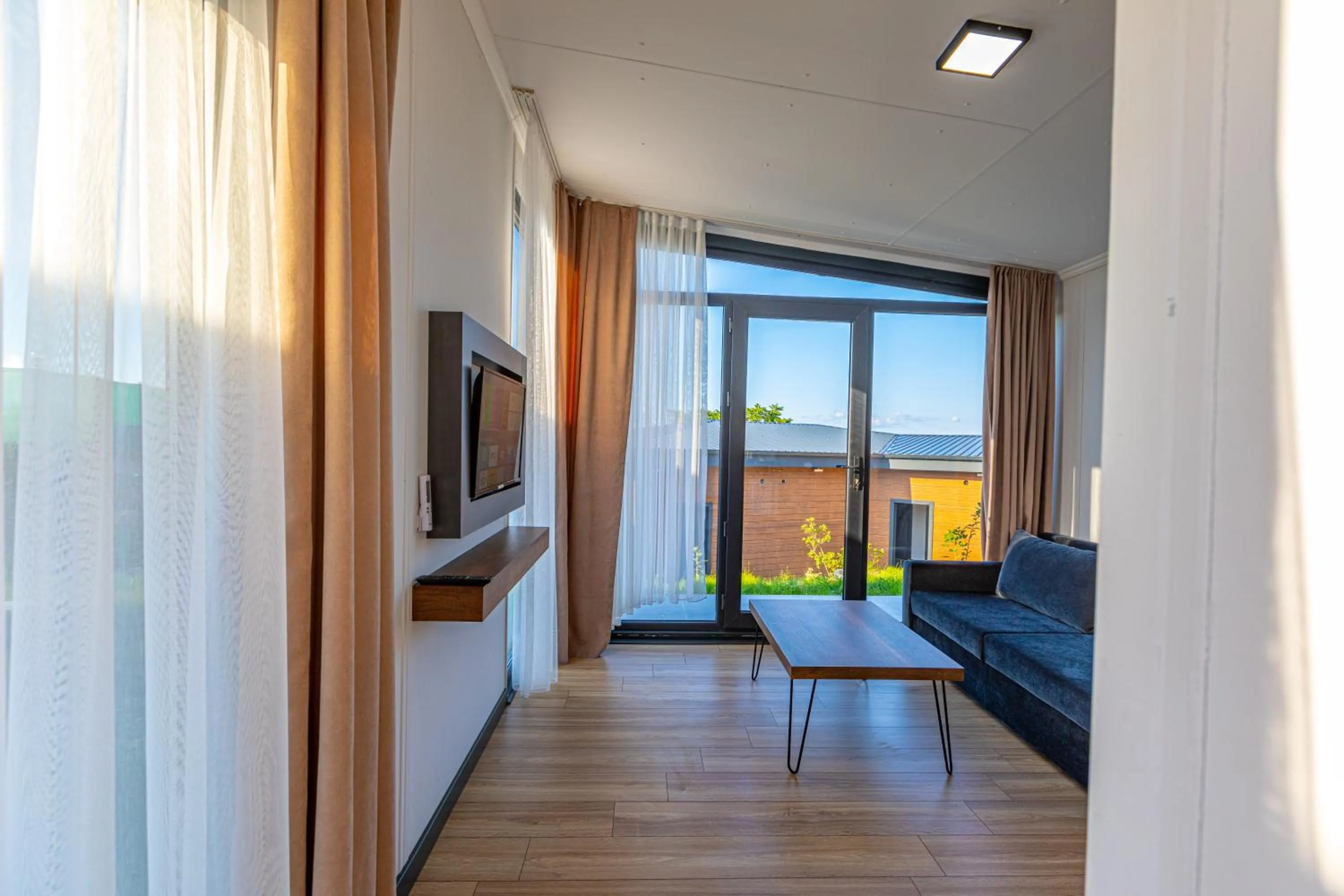 Communal lounge/ TV room in SANTANA OTEL