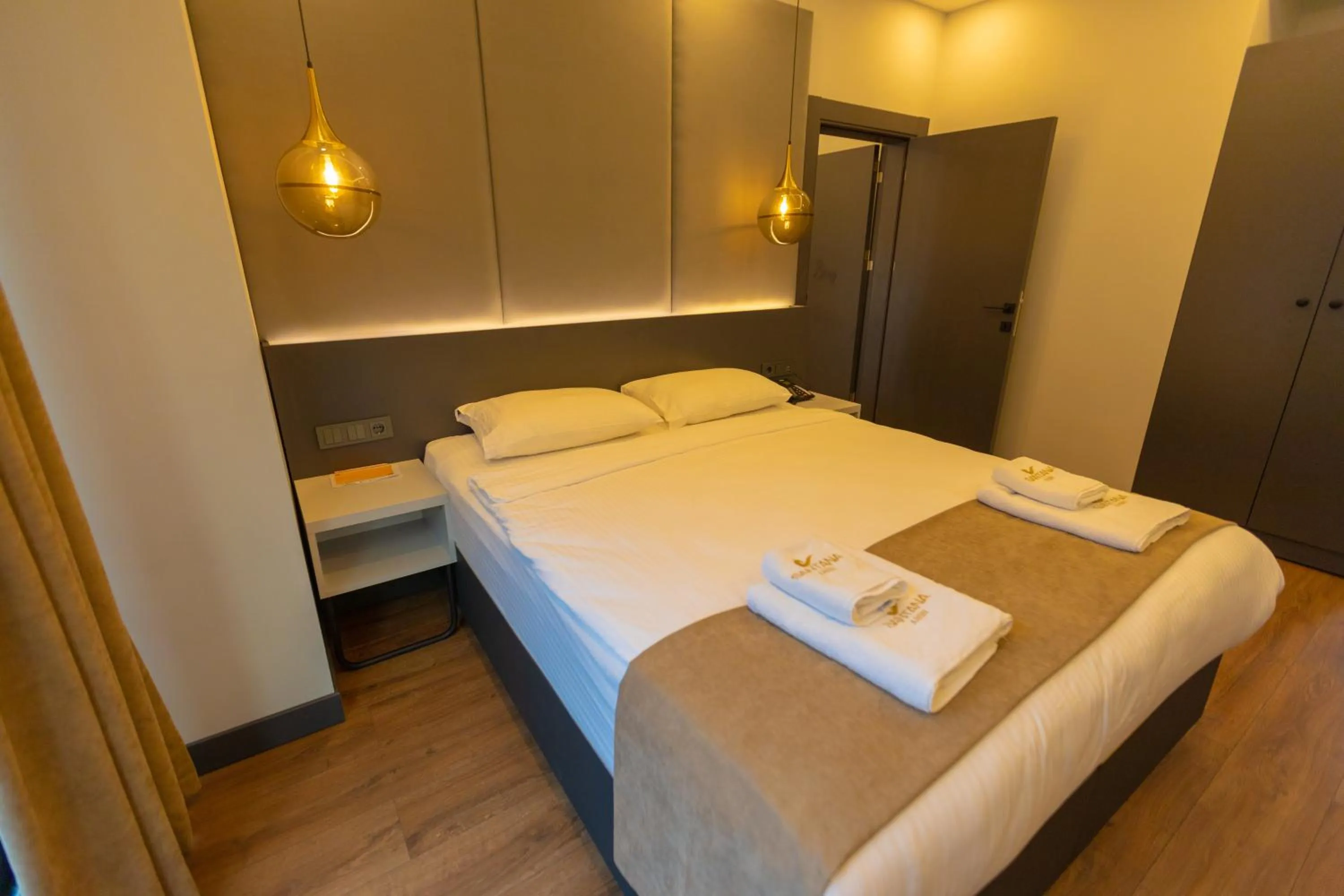 Photo of the whole room, Bed in SANTANA OTEL