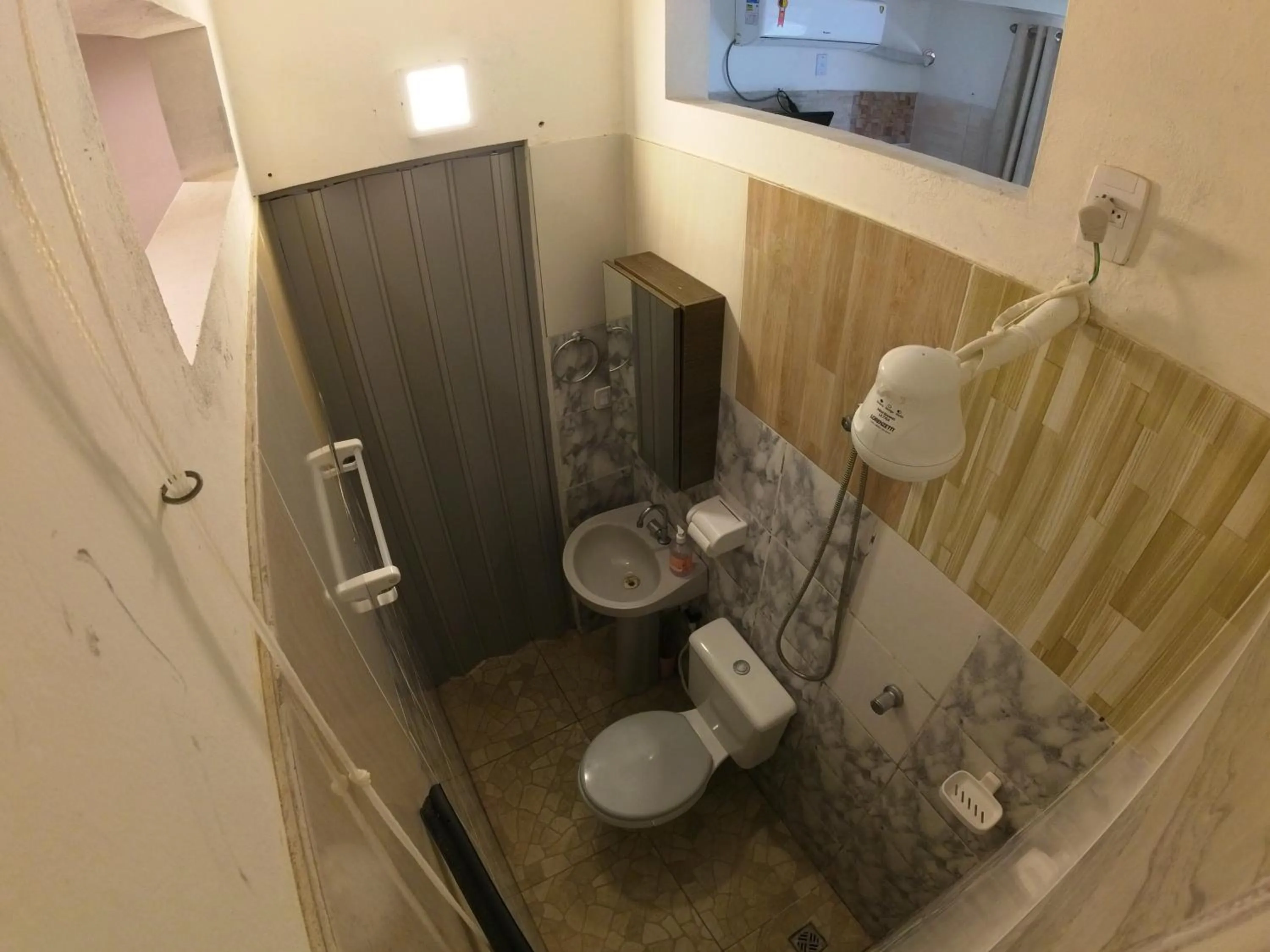 Toilet in Kitnet Perto da Primeira Praia