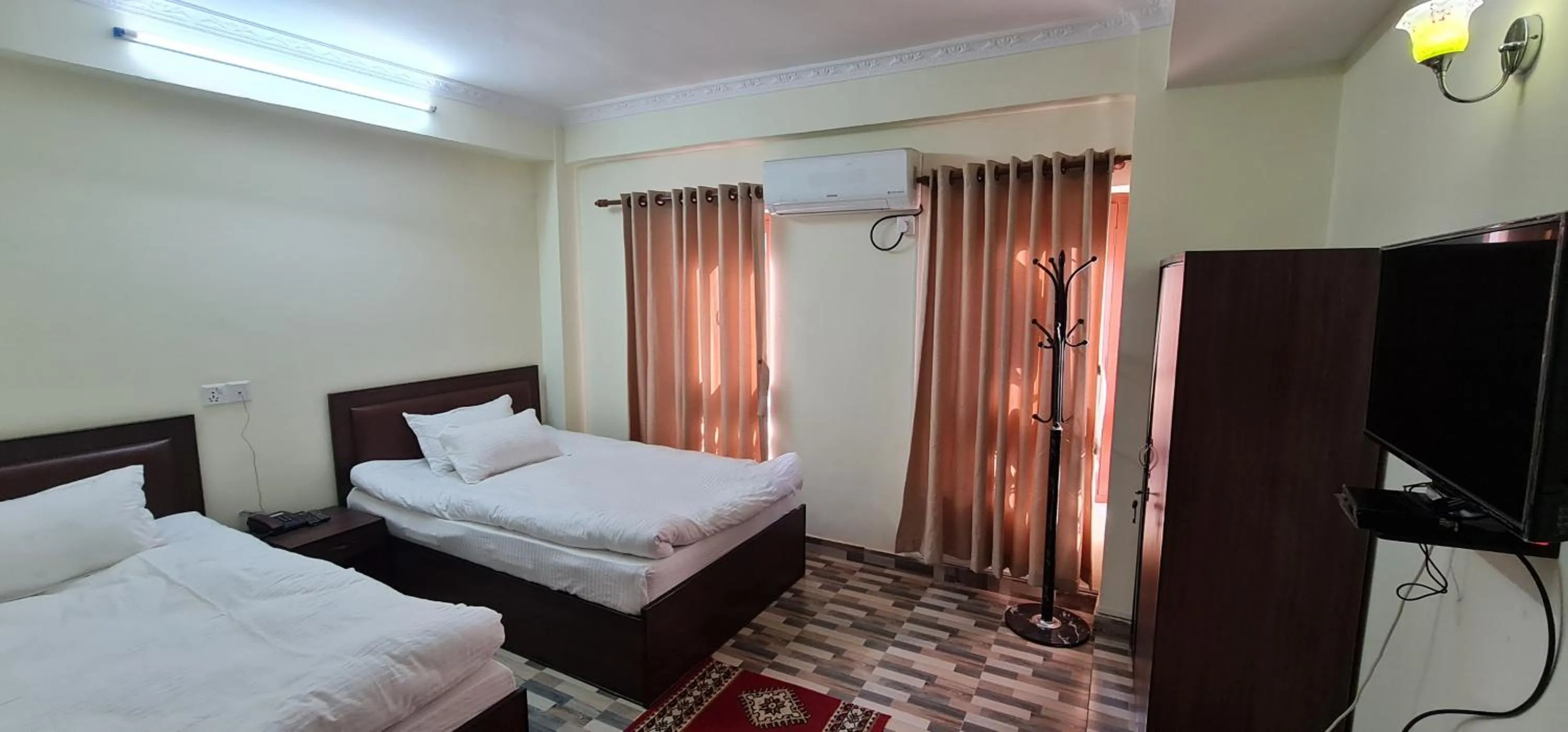 Photo of the whole room, Bed in Pashupati View Hotel