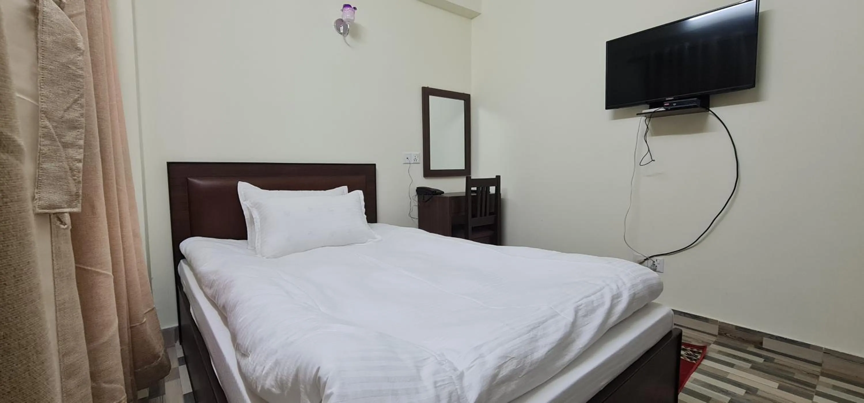 Photo of the whole room, Bed in Pashupati View Hotel