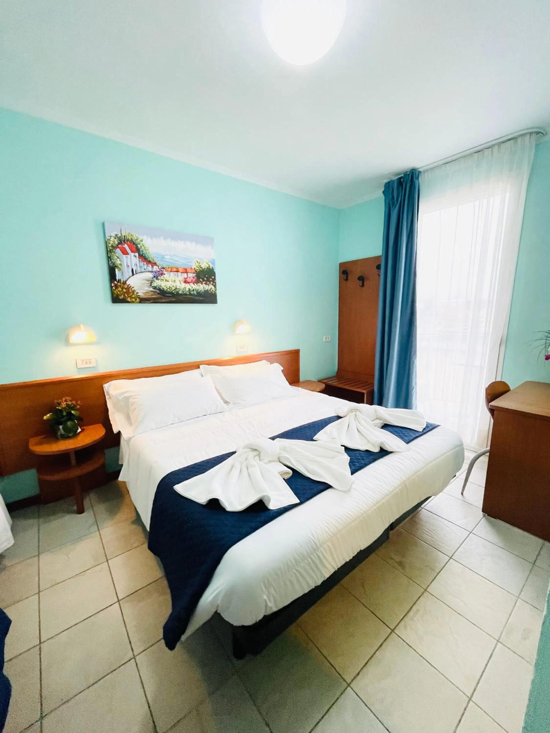 Bed in Hotel Blue Moon