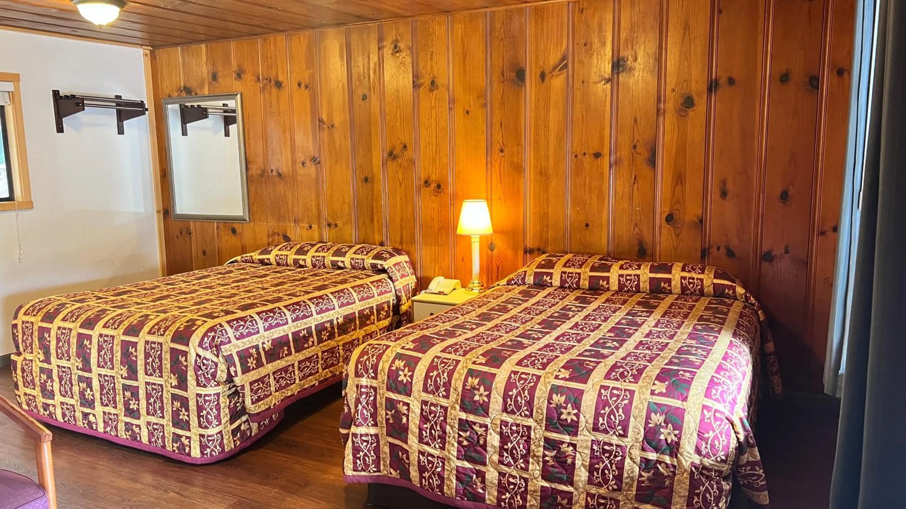 Bed in Pine Cone Motel