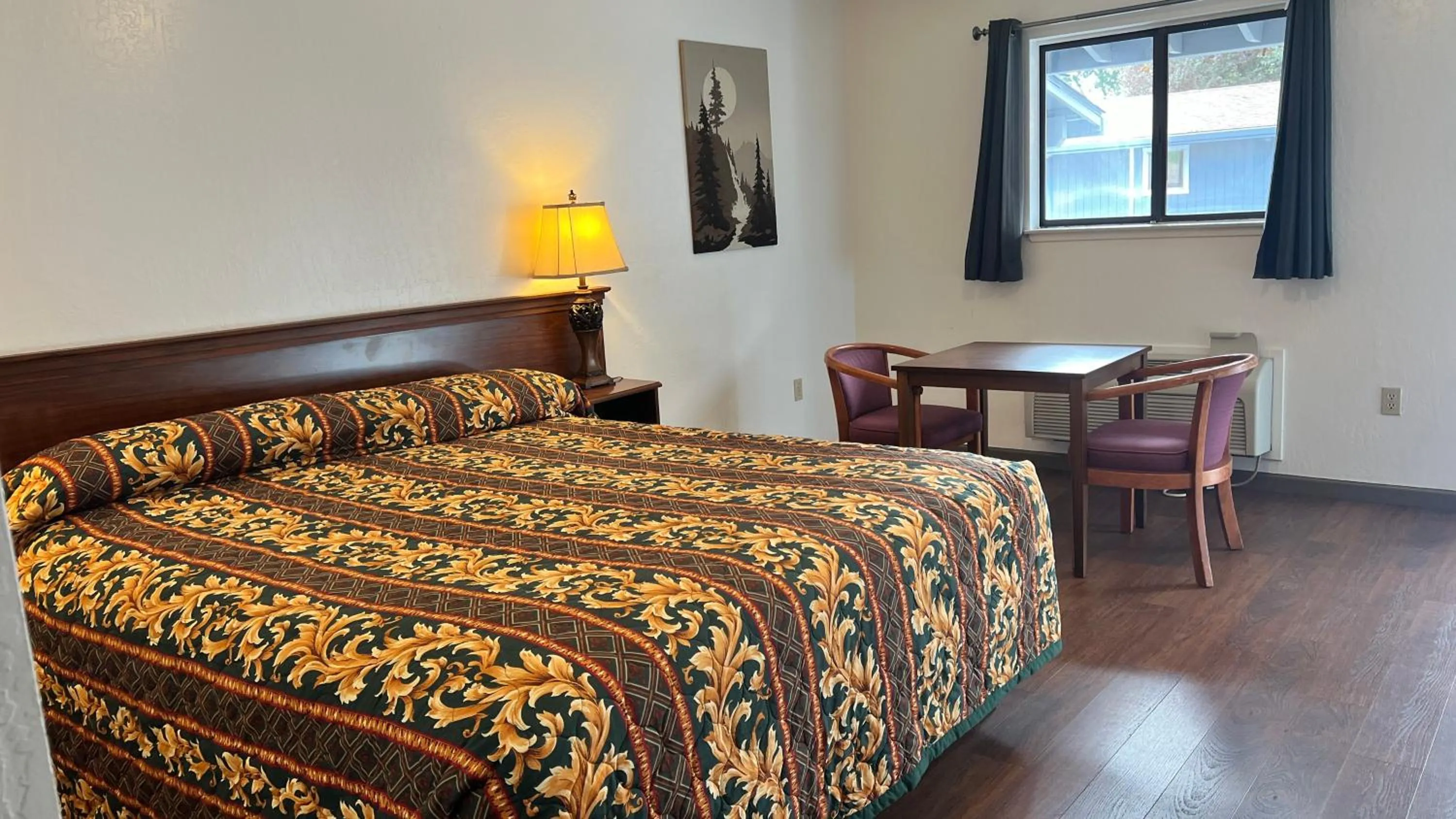 Bed in Pine Cone Motel