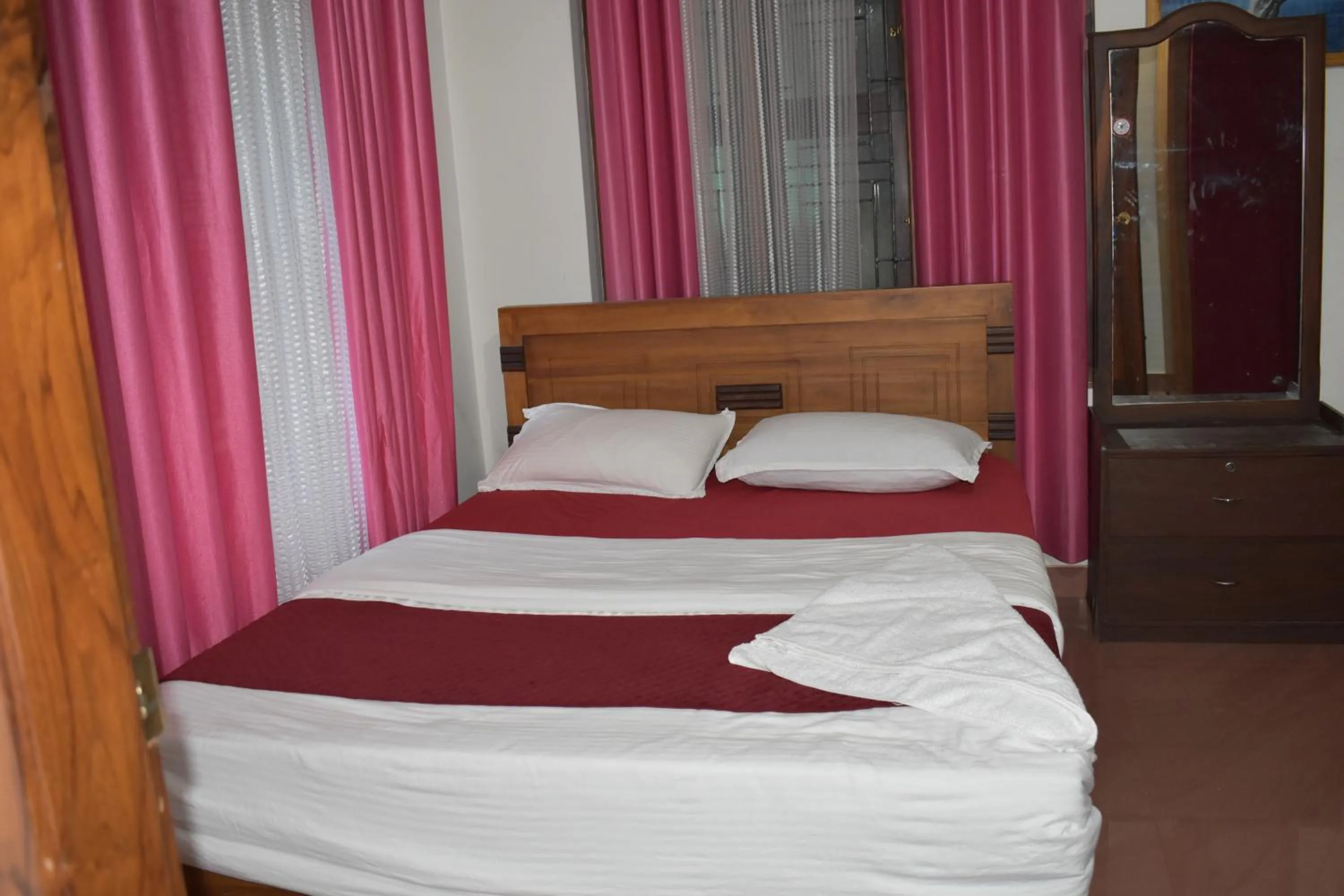 Bed in Ben's Villa Kannur !