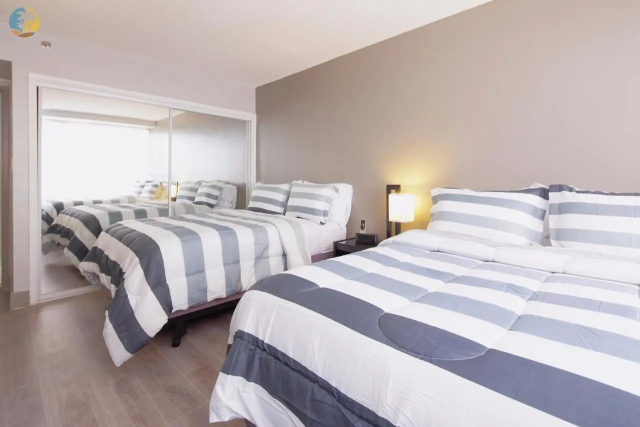 Bed in Deluxe Beach Resort - HORA RENTALS