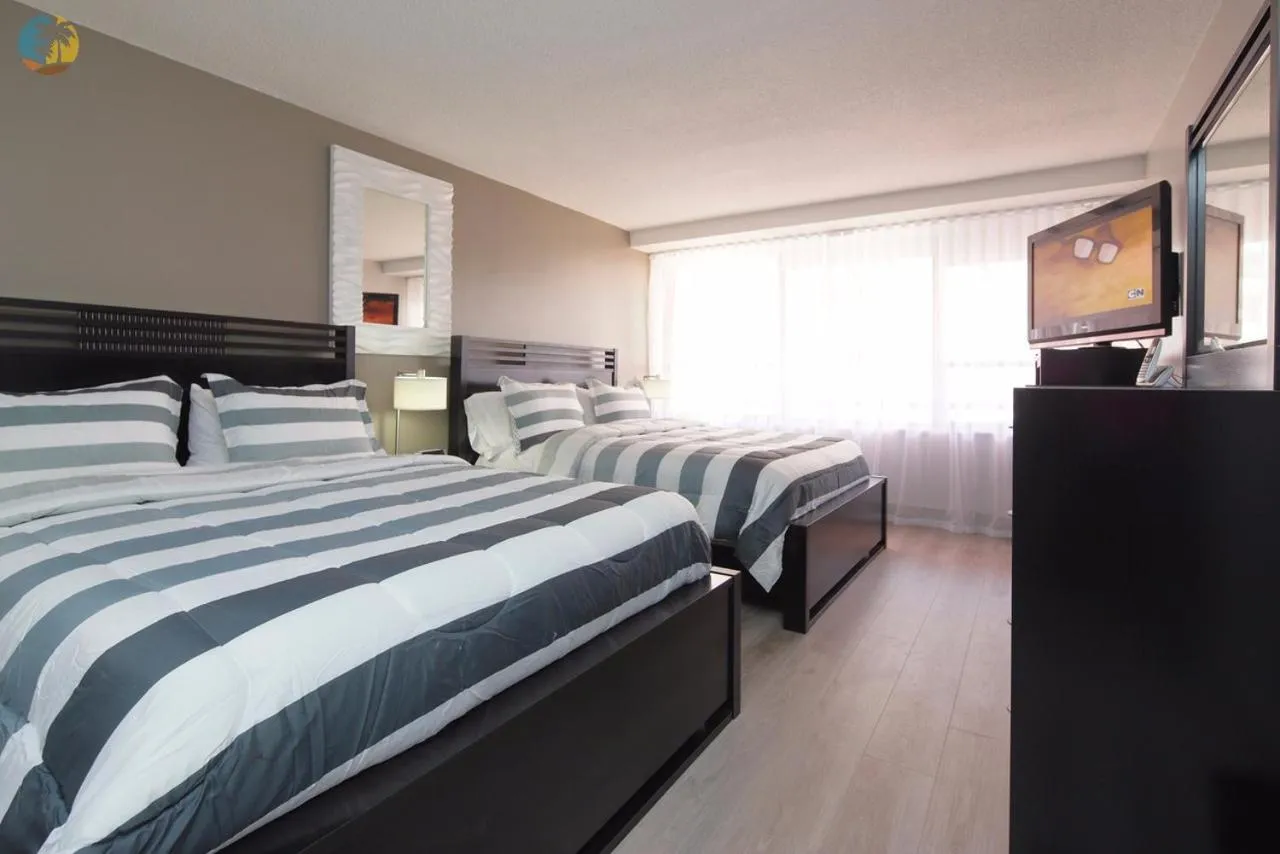 Bed in Deluxe Beach Resort - HORA RENTALS